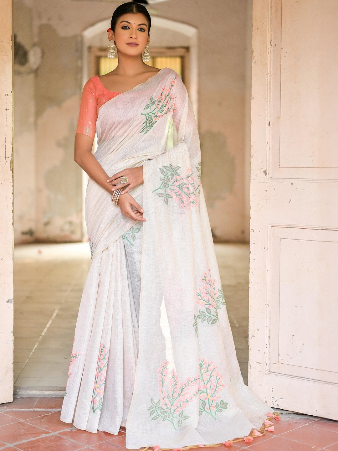Peach Petals Floral Woven Muga Cotton Saree with Zari Patta and Tassels