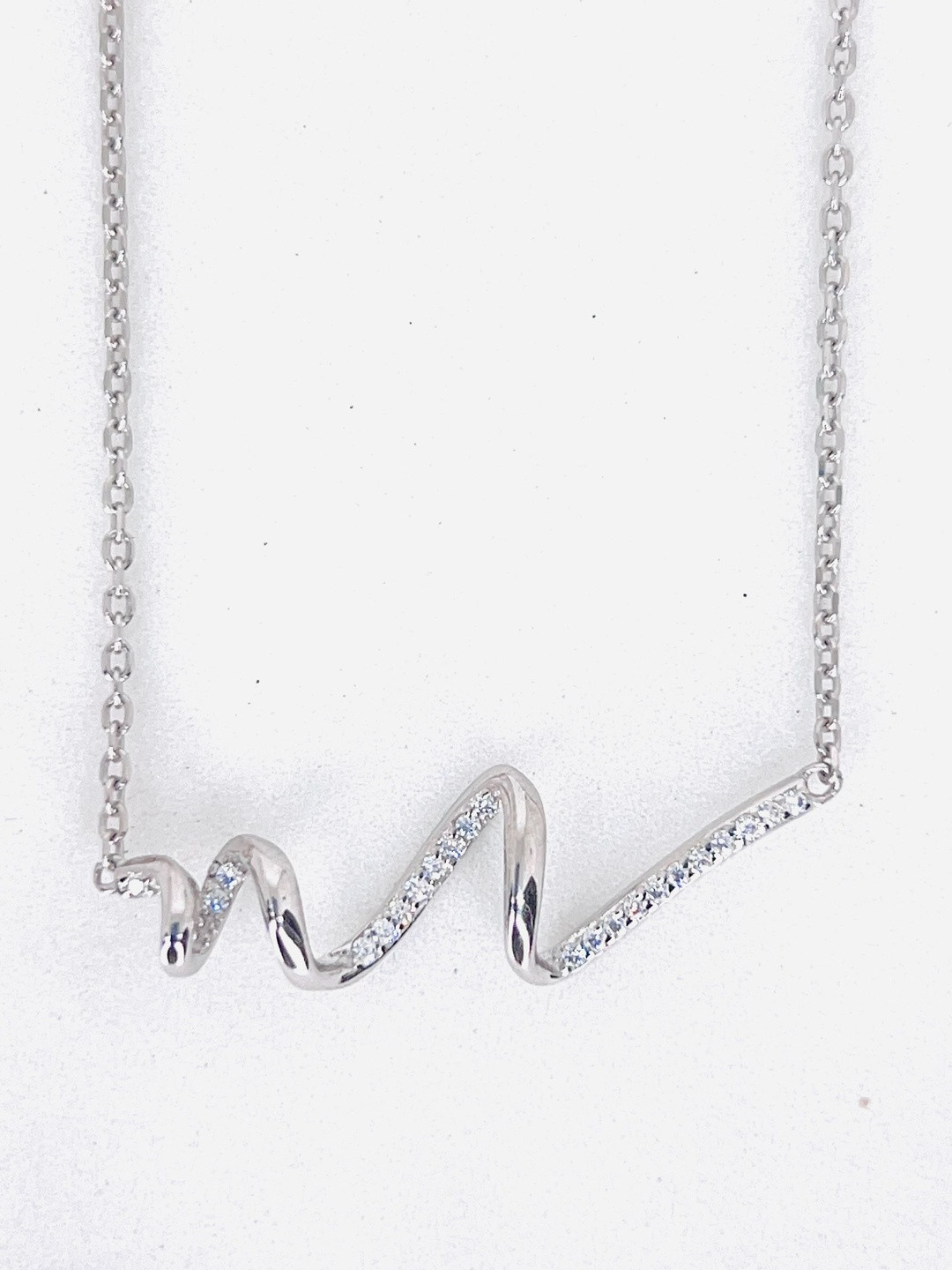 Rukmi Sterling Silver Rhodium-Plated Zircon Studded Contemporary Pendant With Chain