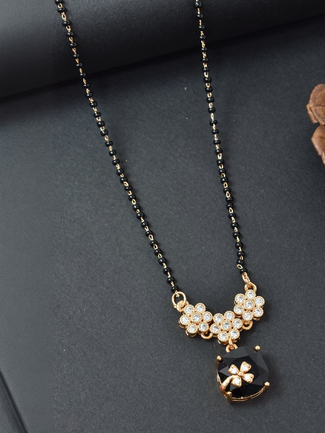 MEIRA JEWELLERY Gold-Plated Artificial Stones Studded And Beaded Twin Chain Mangalsutra