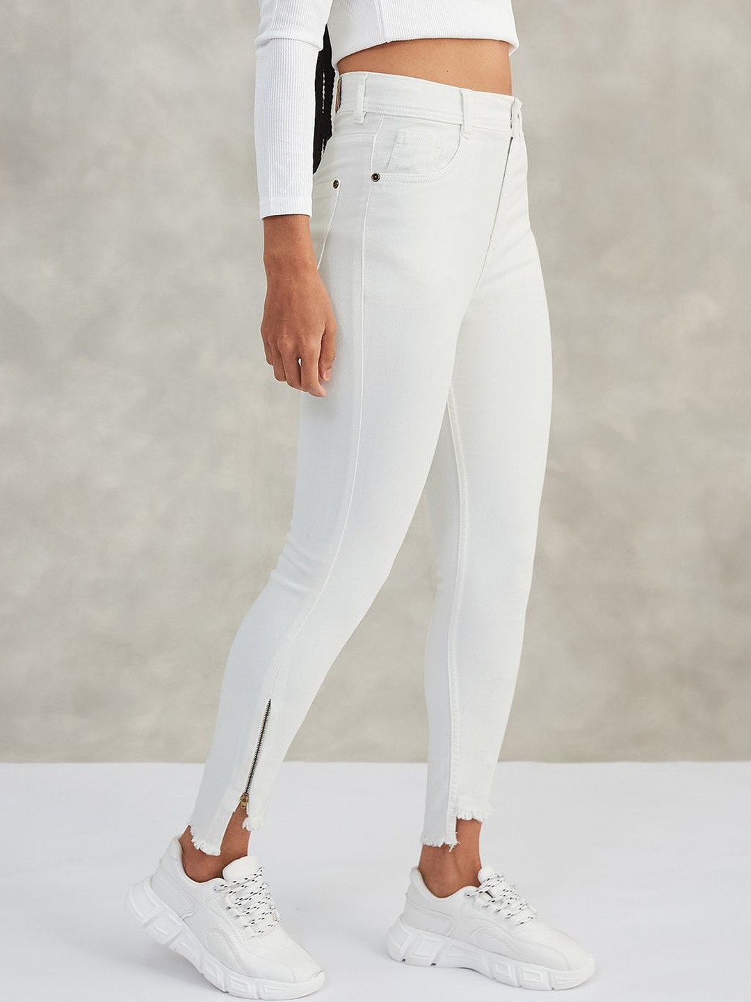 DOLCE CRUDO Women's Skinny Fit High Rise Side Slit Raw Edge Stretchable Denim Jeans