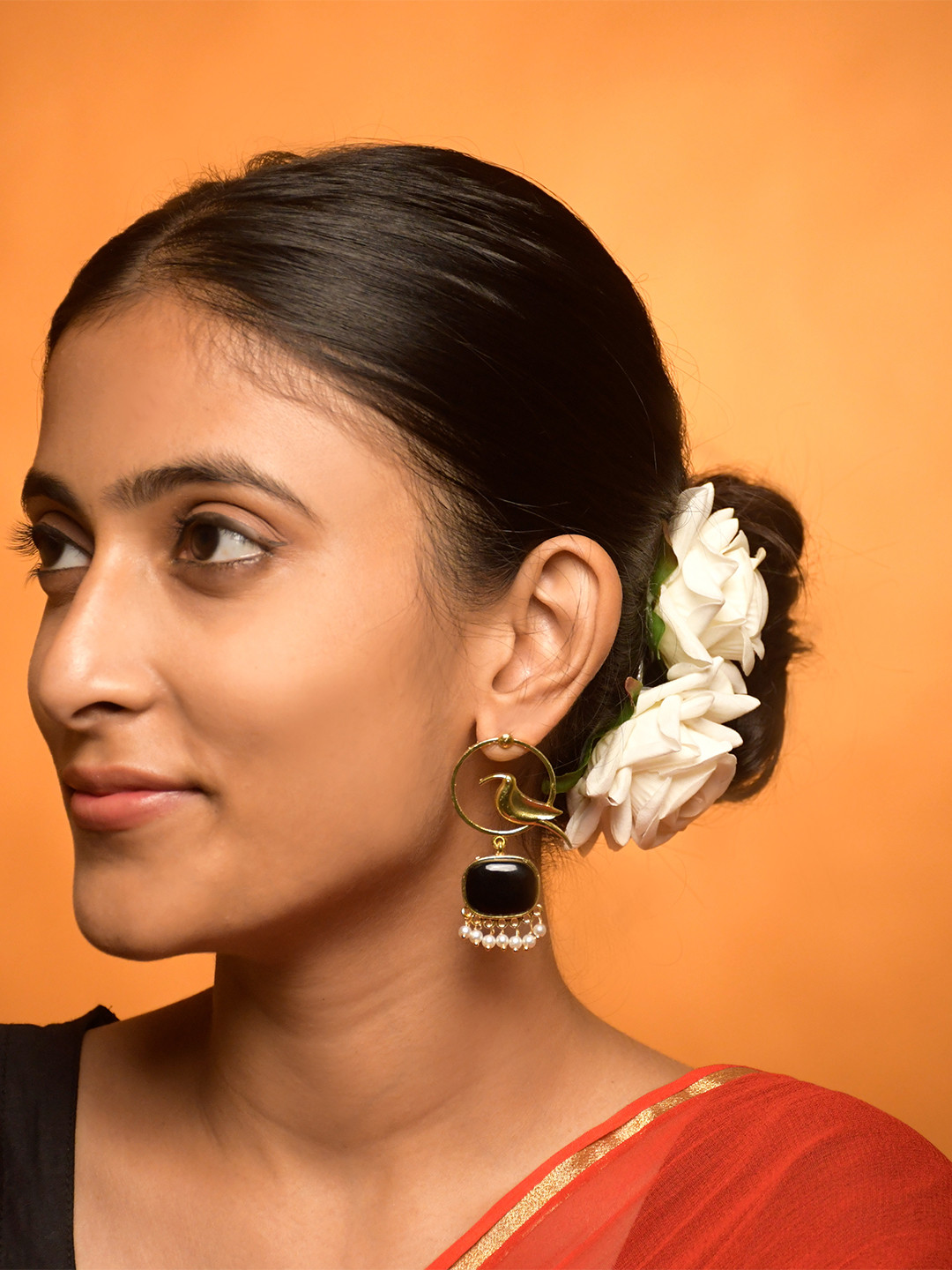 NAMAN ARTS Gold-Plated Artificial Stones Studded and Beaded Animal Shaped Drop Earrings