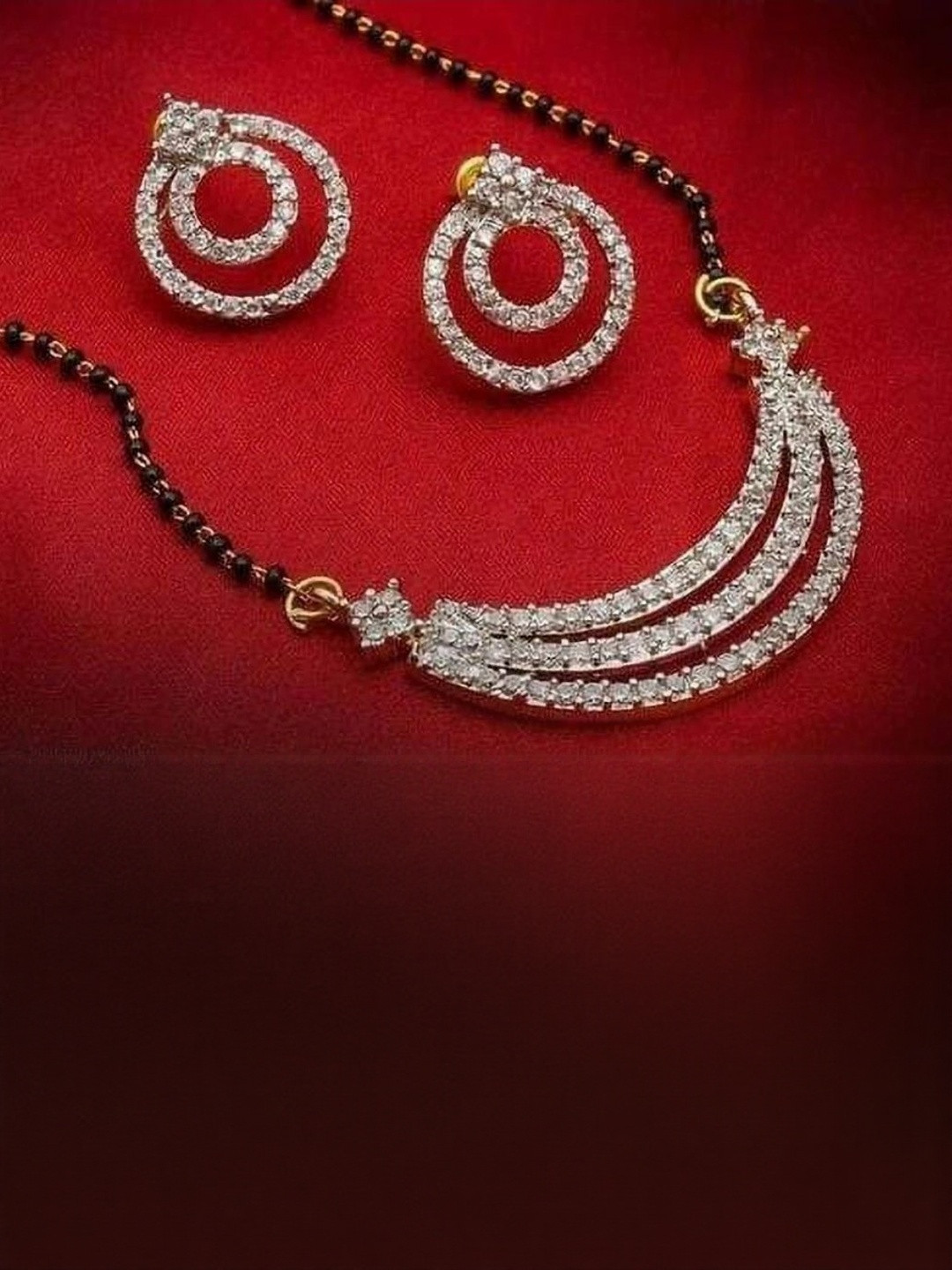 JD World Women Stone Studded Mangalstura With Earrings