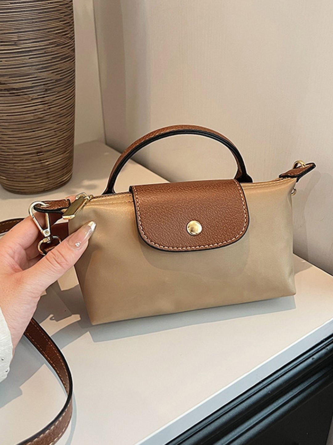 StyleCast Solid One Handle Synthetic Leather Sling Bag Wit Detachable Sling Strap