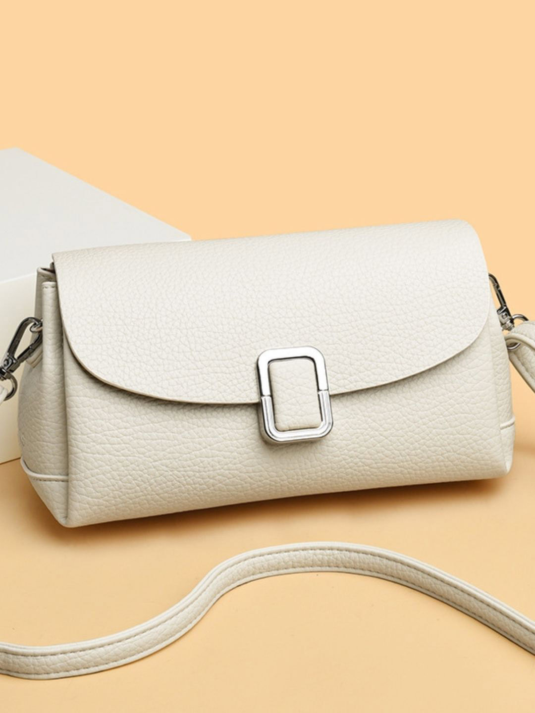 StyleCast Off White Solid One Handle PU Sling Bag Wit Detachable Sling Strap