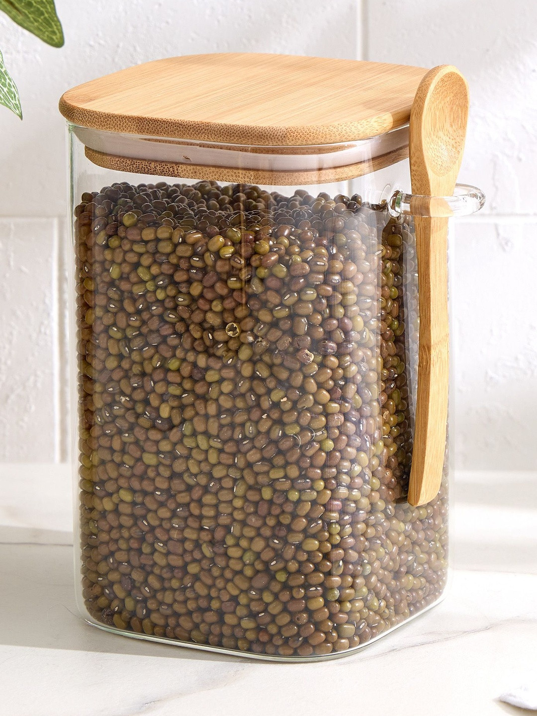 Home Centre Regal Luxe Transparent Easy to Clean Push Button Jar With Spoon- 1.1 l