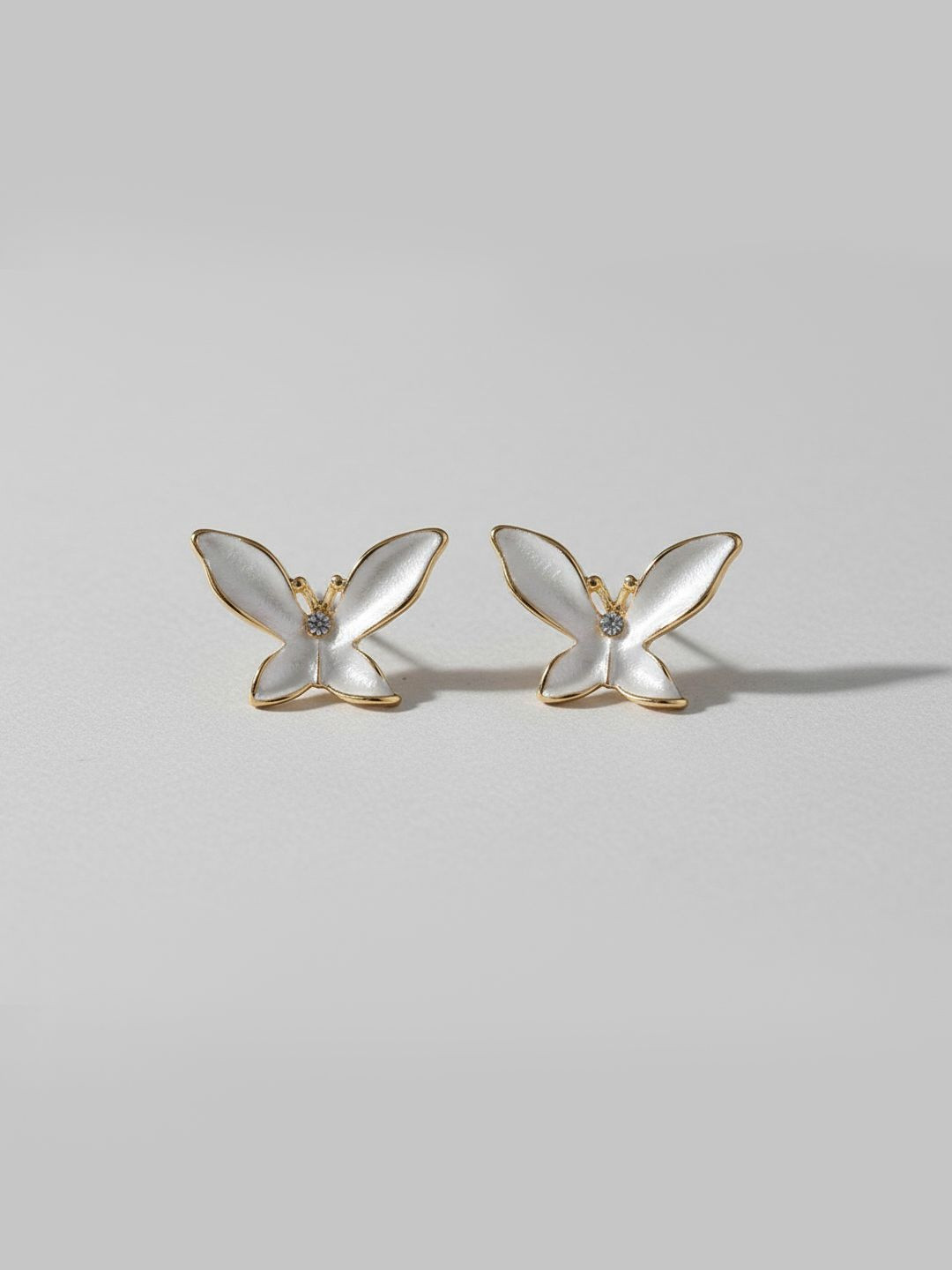 VAGHBHATT Animal Shaped Studs Earrings