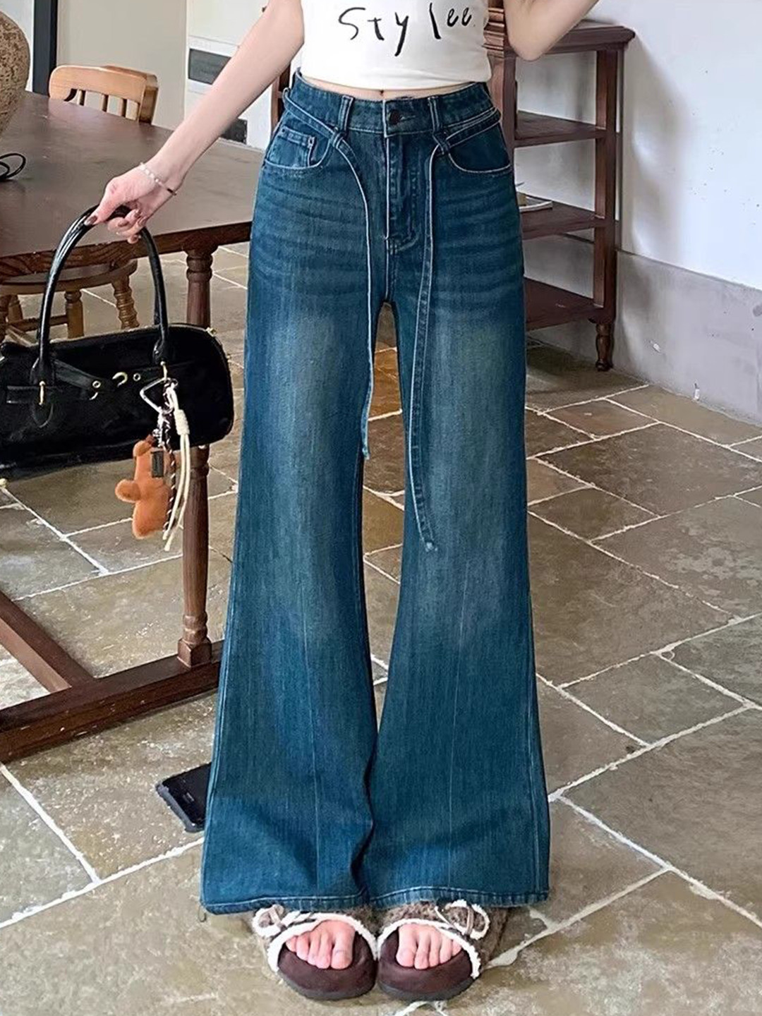 StyleCast Women Flared High-Rise Heavy Fade Stretchable Jeans with Belt
