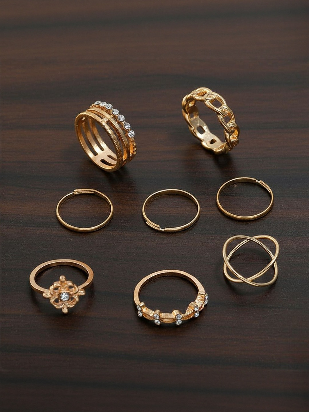DressBerry Set Of 8 Gold-Plated Cubic Zirconia Studded Twist Cross Chain Finger Rings