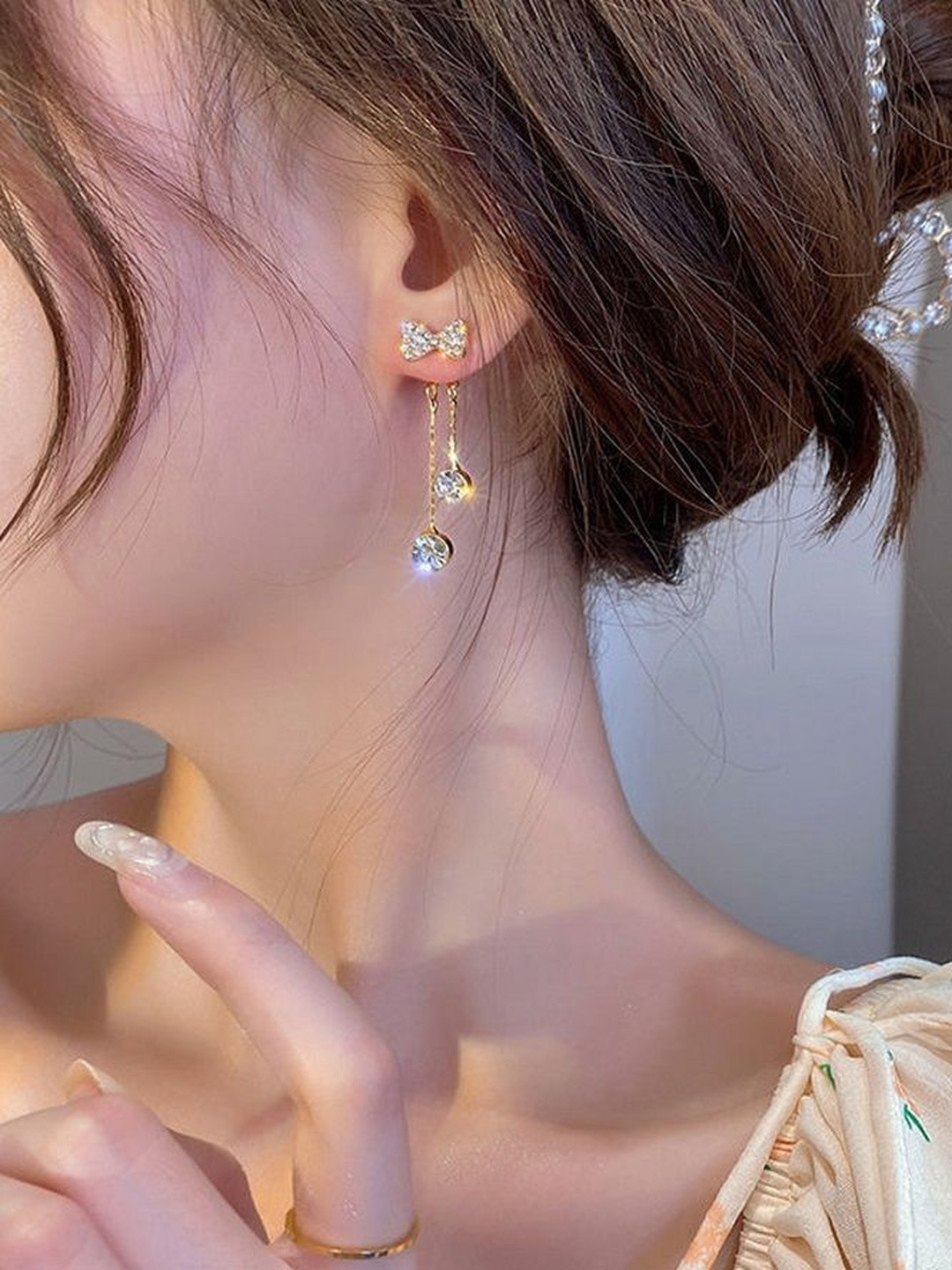 TheVineGirl Contemporary Korean Studded Bow Shiny Tassels Drop Earrings
