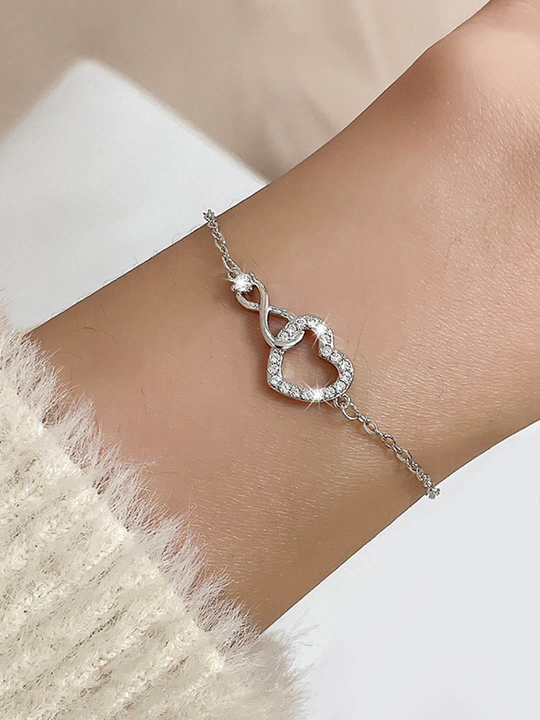 Peora Silver-Plated Cubic Zirconia Studded Charm Bracelet