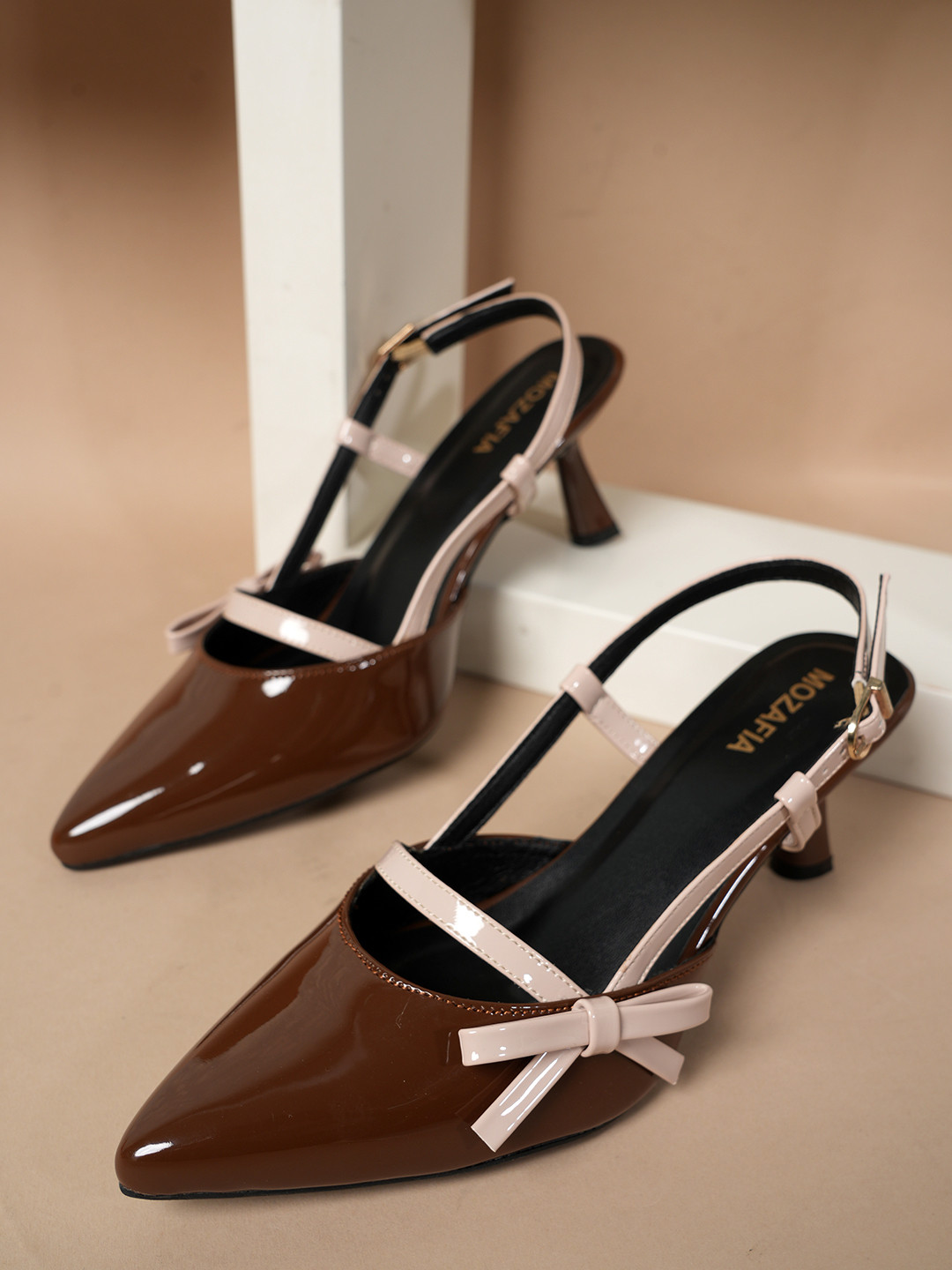 MOZAFIA Women Solid SyntheticBlock Pumps with Bows