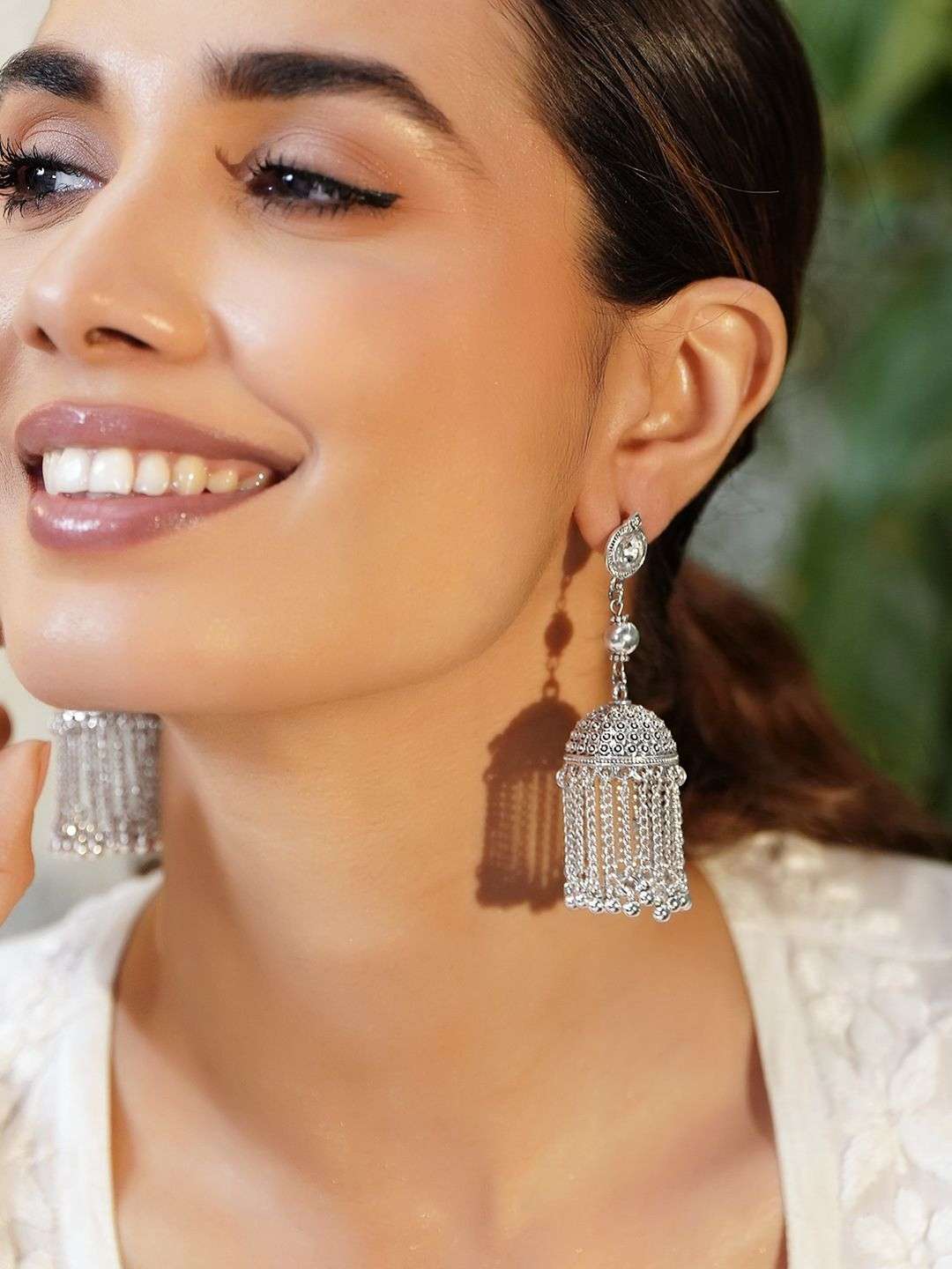 Rubans Oxidised Silver-Plated Long Dome Jhumka Earrings with White Stone & Chain Tassels