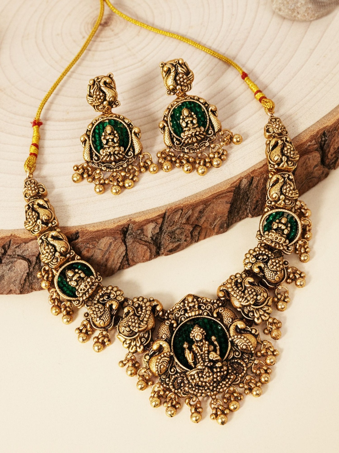 KARATCART Gold-Plated Crystals Stone-Studded Goddess Lakshmi Temple Antique Jewellery Set