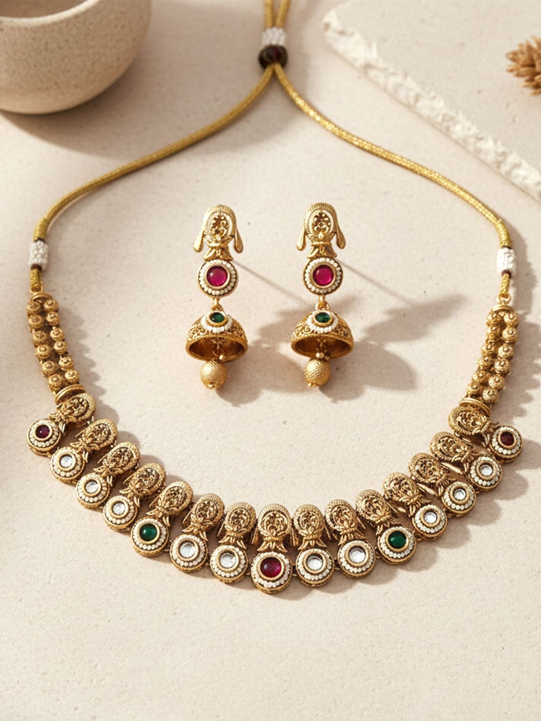 KARATCART Gold-Plated Stones-Studded Antique-Finish Temple-Inspired Jewellery Set
