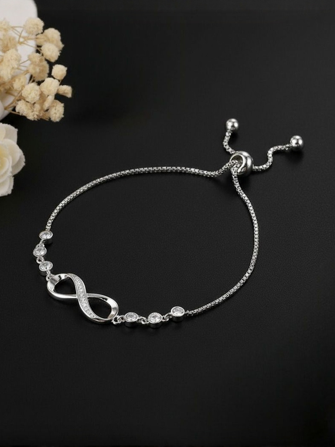 DressBerry Silver-Plated Cubic Zirconia Studded Infinity Design Wraparound Bracelet