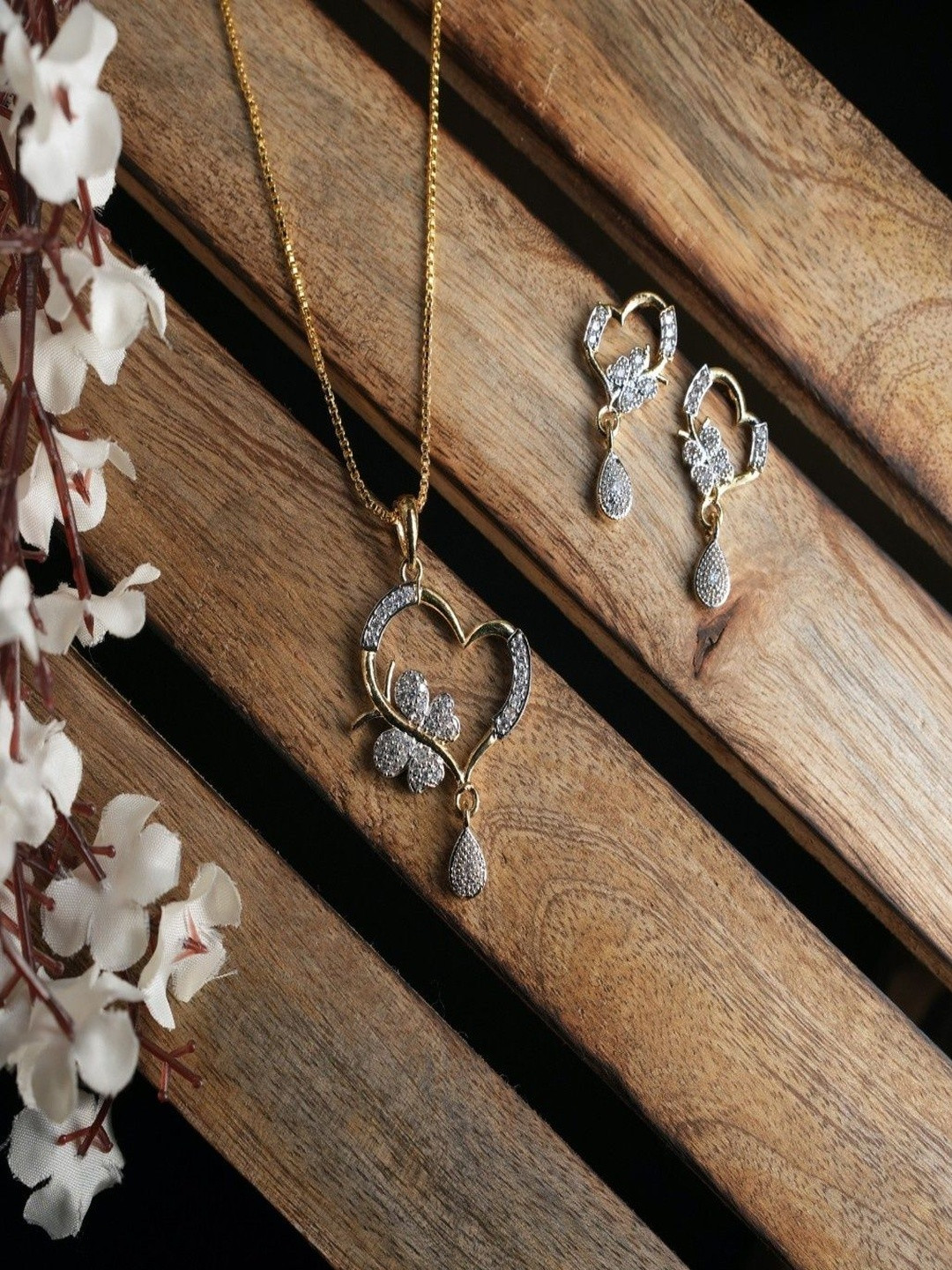 Neelayaa Gold Plated Cubic Zirconia Studded Butterfly Pendant & Earrings