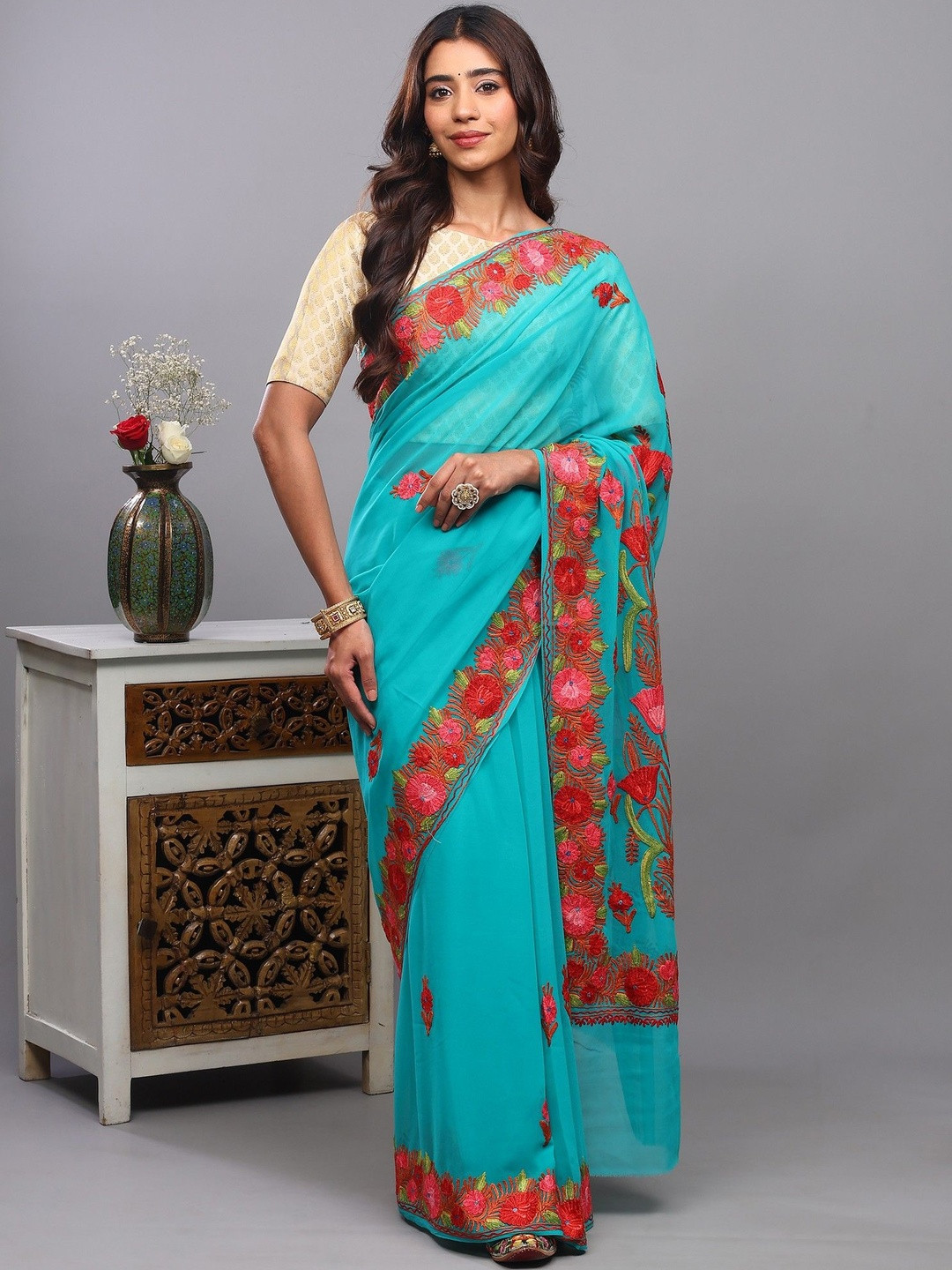 Exotic India Spectra-Green Georgette Saree with Aari Embroidered Floral Motifs
