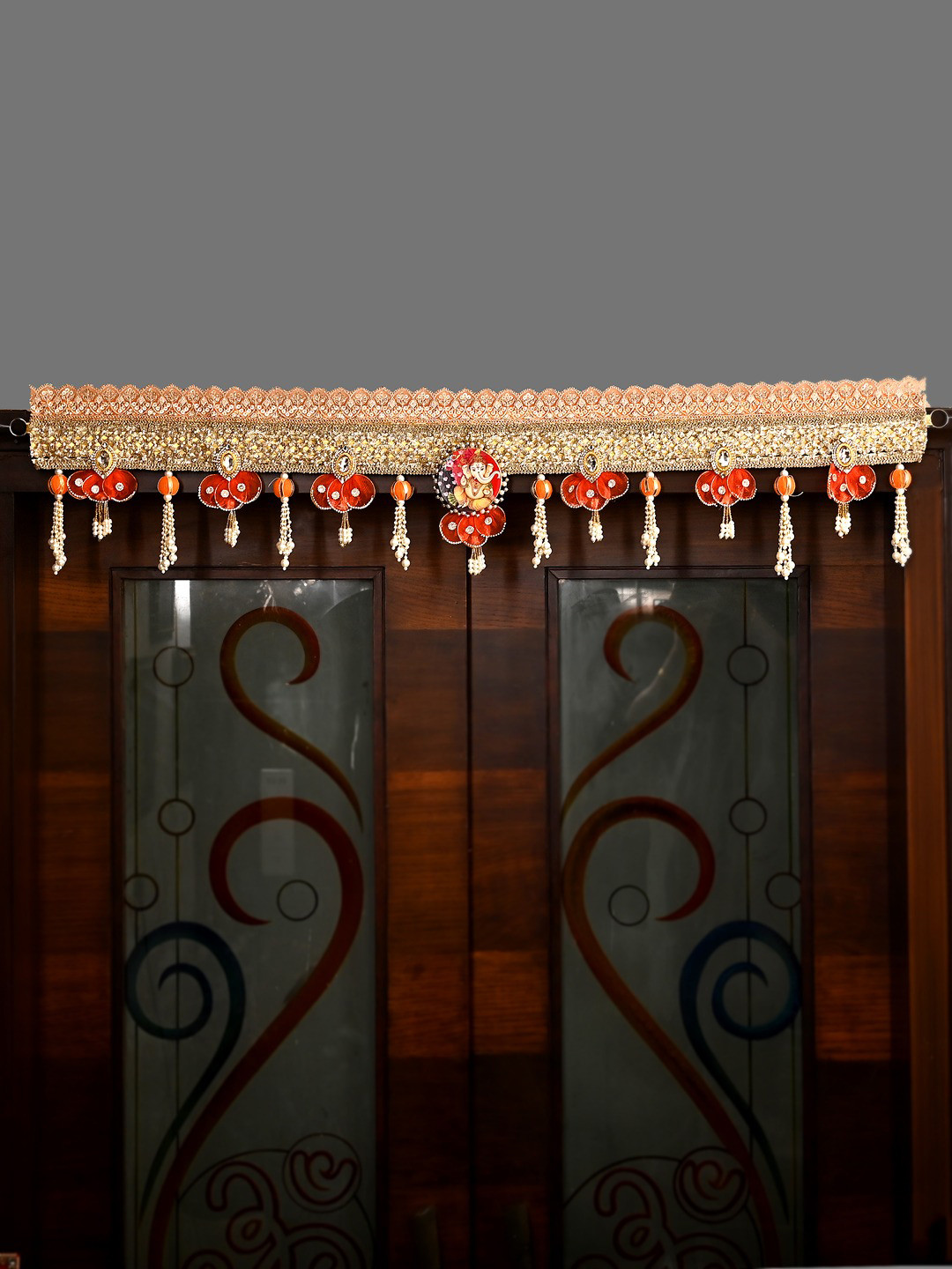 Aapno Rajasthan Gold Toned And Red Artificial Beaded Ganesha Toran