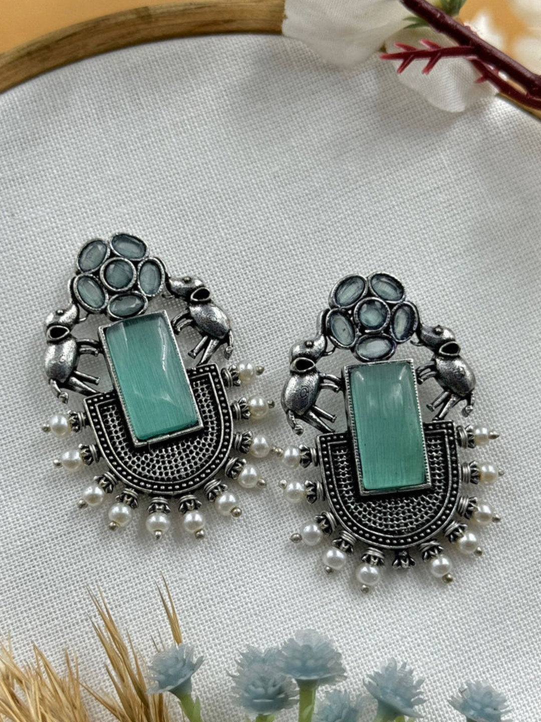 NAMAN ARTS Silver-Plated AD Studded And Pearls Beaded Oxidized Elephant Shaped Studs