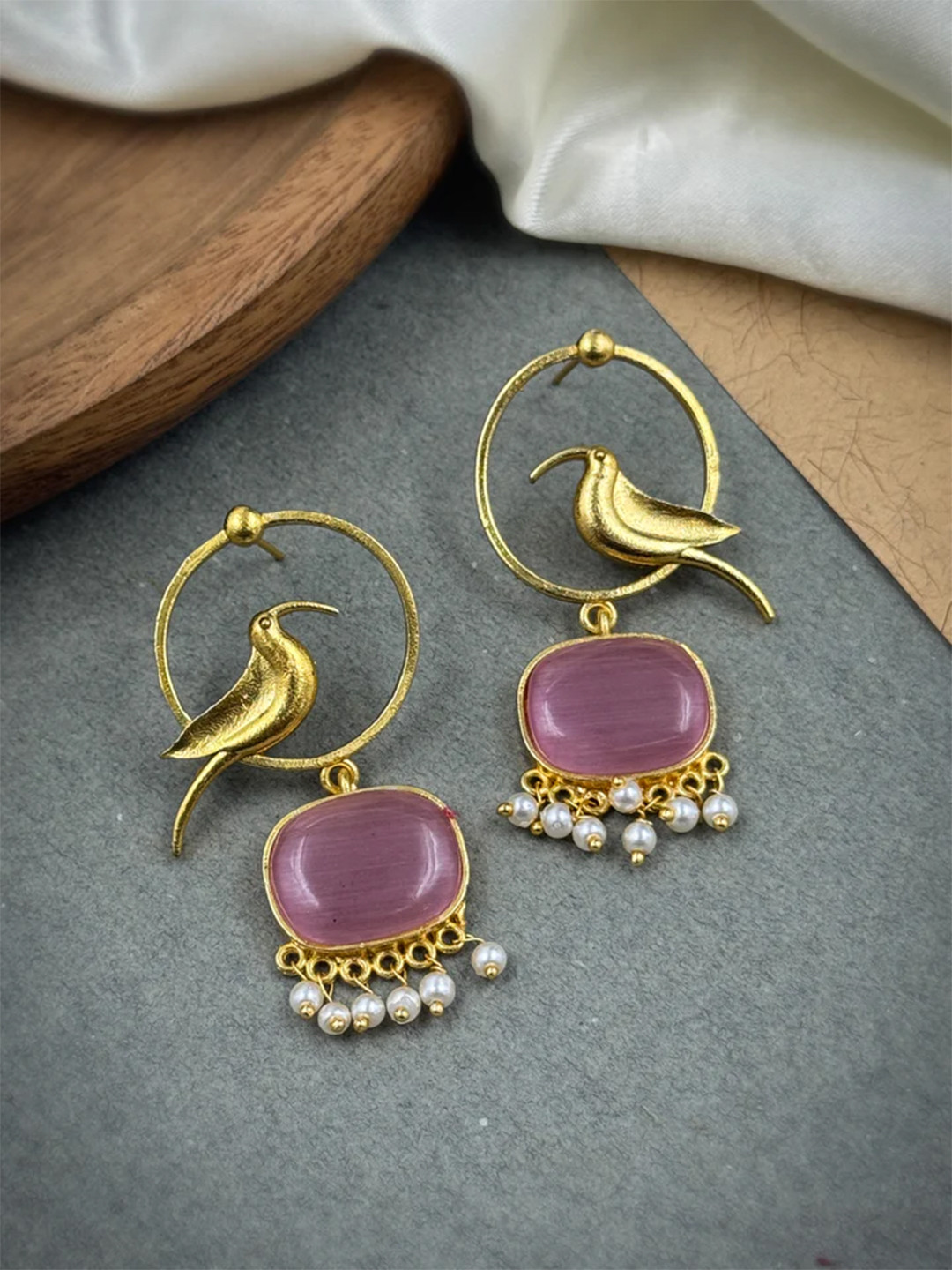 NAMAN ARTS Gold-Plated Artificial Stones Studded & Beaded Oxidised Drop Earrings