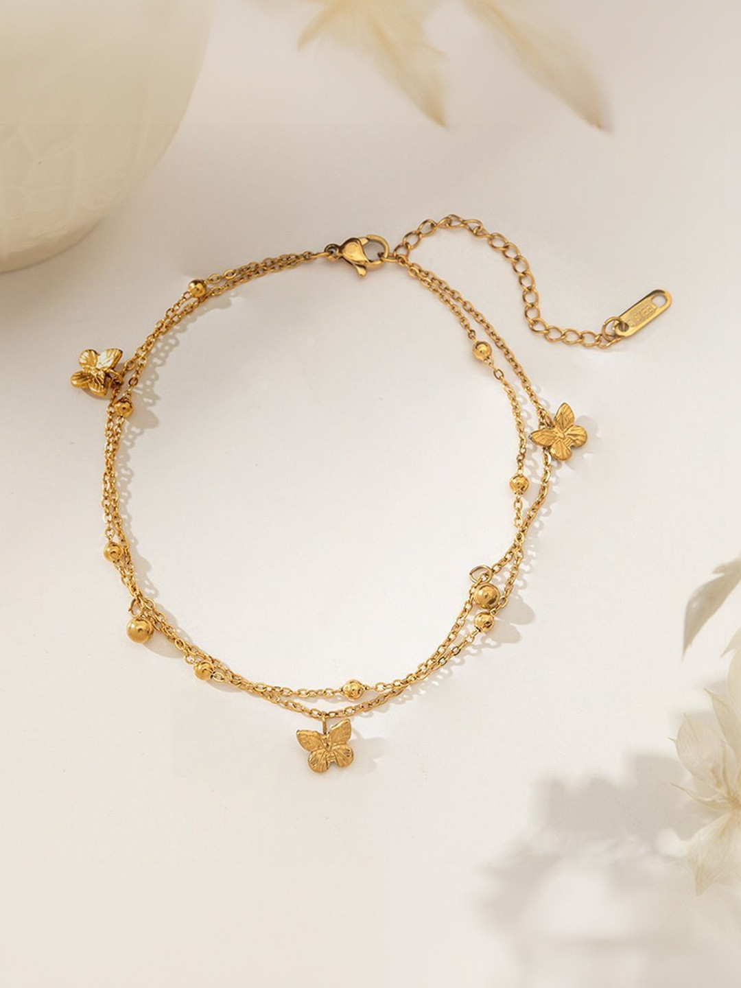MYKI Stainless Steel Gold-Plated Artificial Beaded Butterfly Charm Layered Bracelet