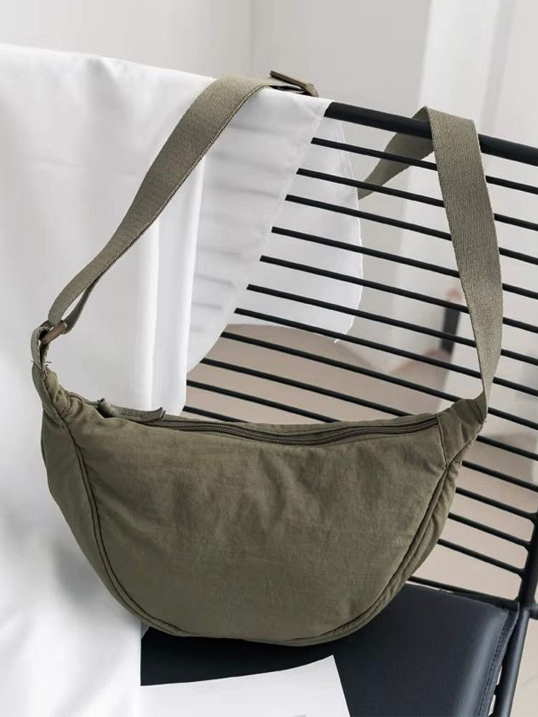 GLOSSY Half Moon Sling Bag with Tasselled