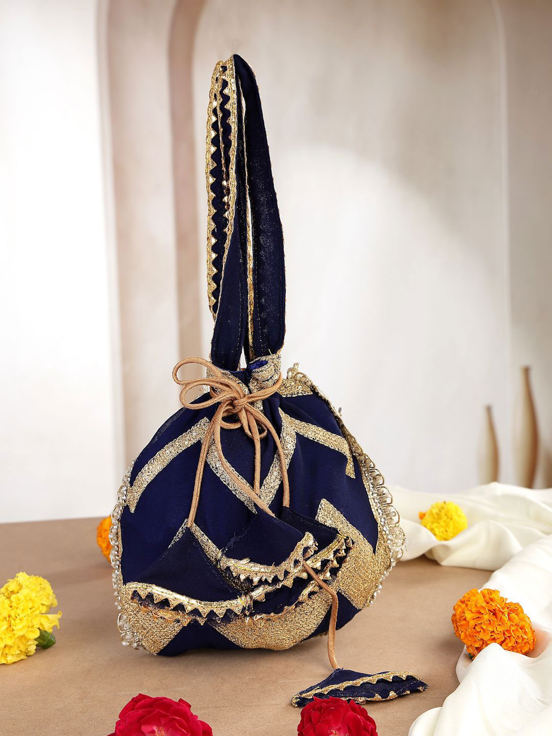 Dhrohar Embroidered Trim and Lace Potli Clutch