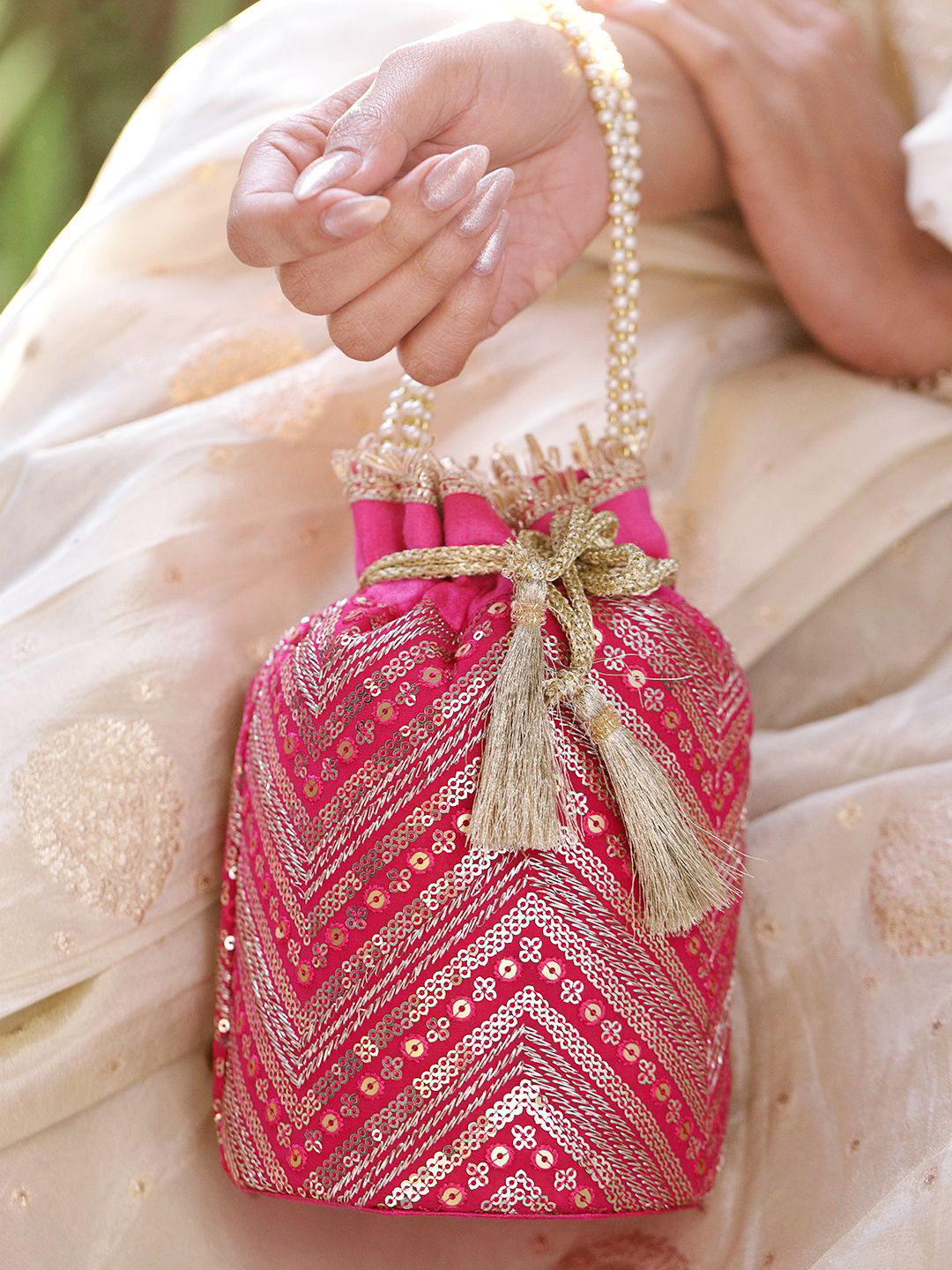 Rubans Hot Pink Sequin Embroidered Festive Potli Bag with Pearl Handle & Golden Tassels
