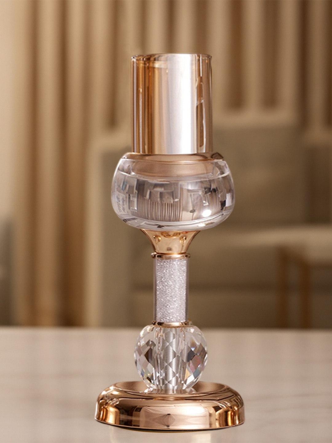 AARVI DECOR STUDIO Gold-Toned & Transparent Filled Metal & Crystal Candle Holder