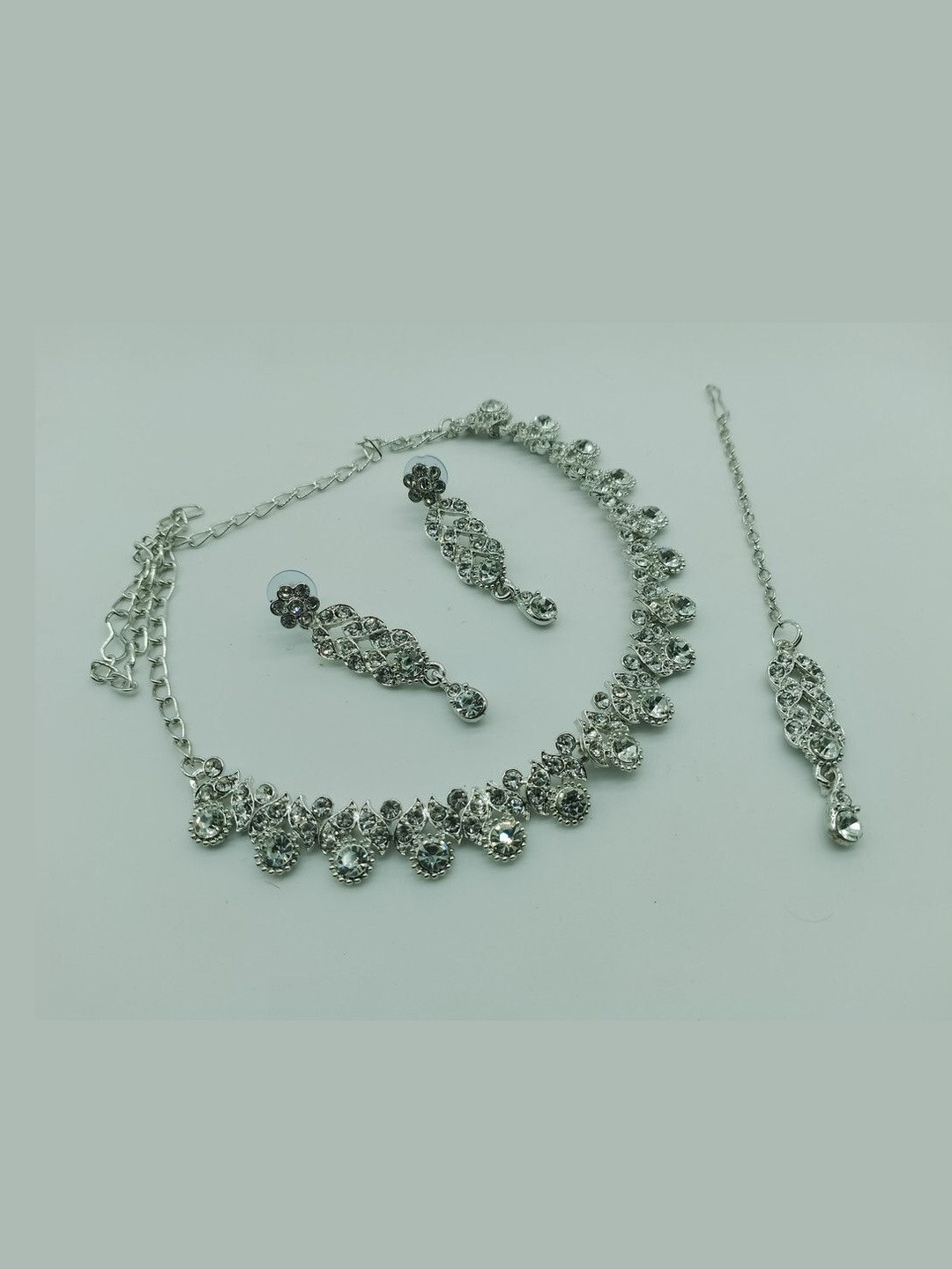 Women Click Silver-Plated Artificial Stone Studded Necklace And Earrings With Maang Tika