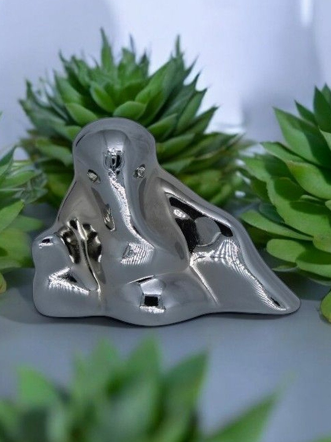 Adhvik Silver-Toned Lord Aaram Rest Ganesha Idol Showpiece