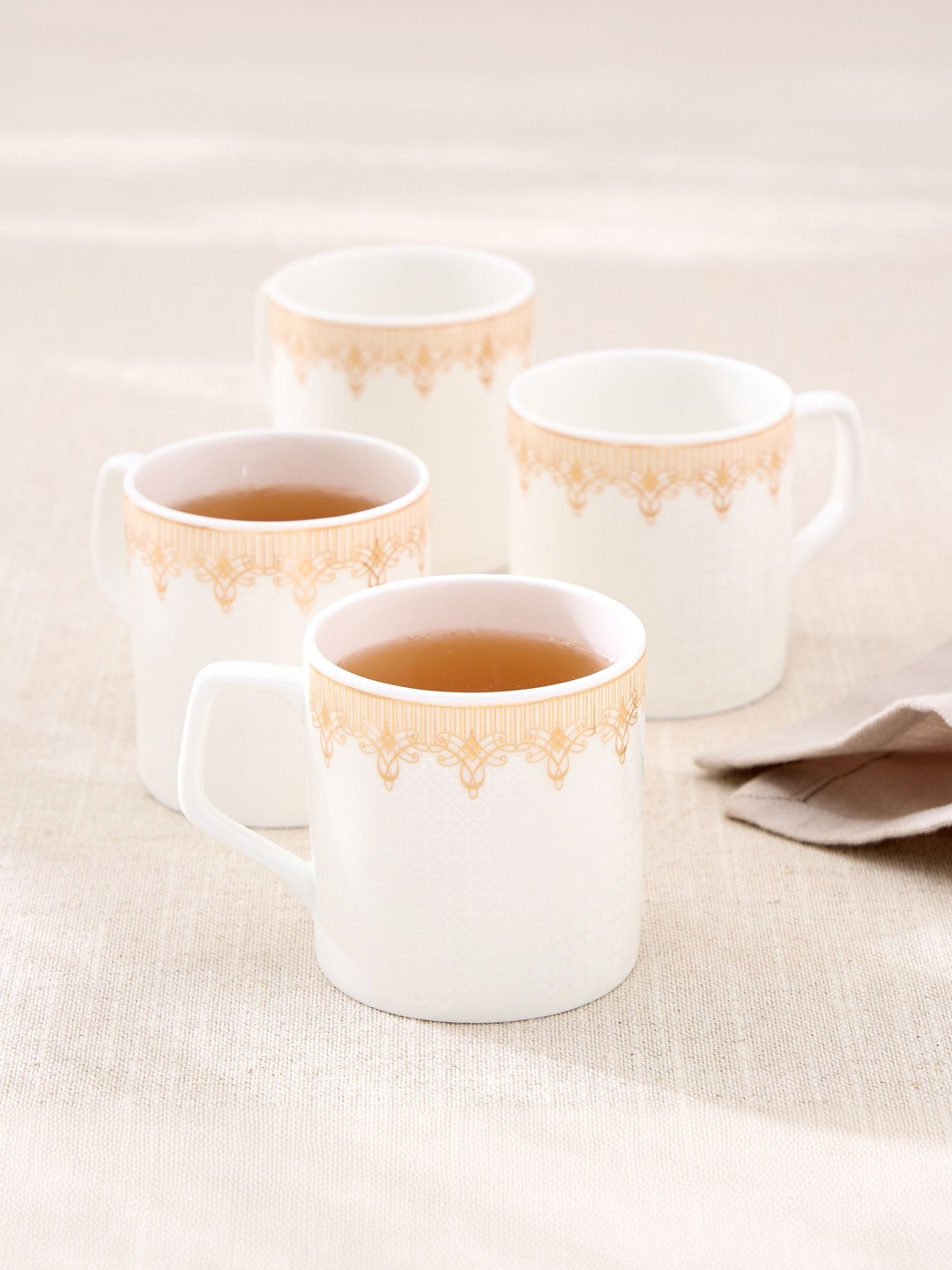 Home Centre White & Off White Ethnic Motifs Porcelain Glossy Core Set of Cups and Mugs