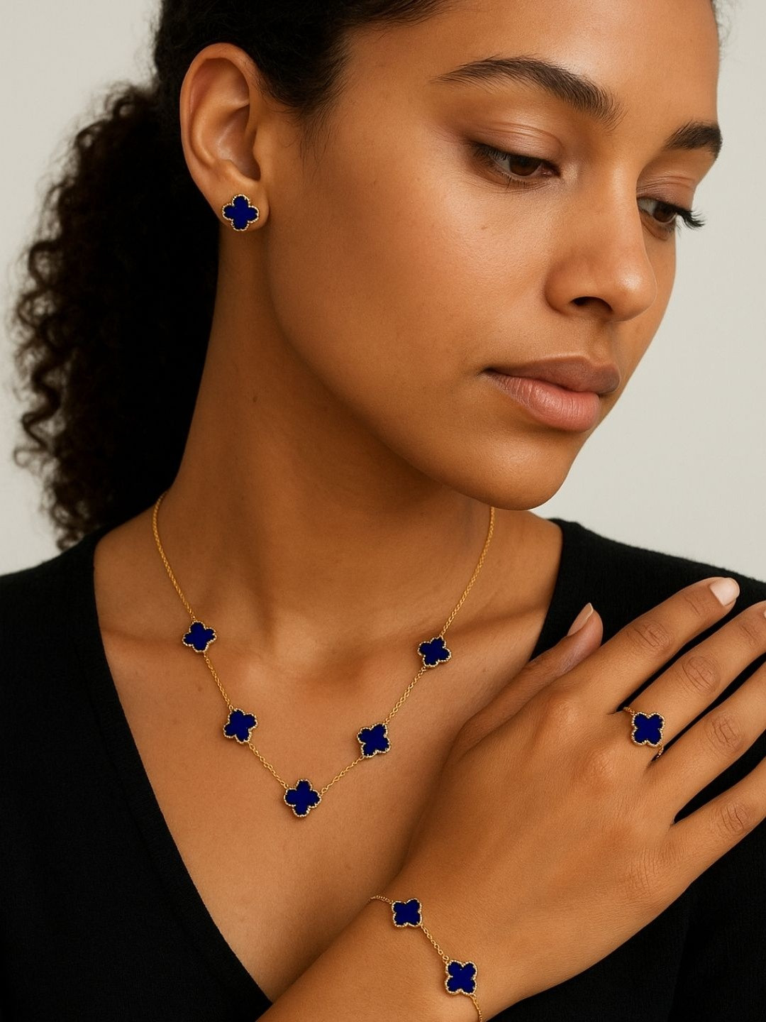 Women Click Gold-Plated Stone-Studded Jewellery Set