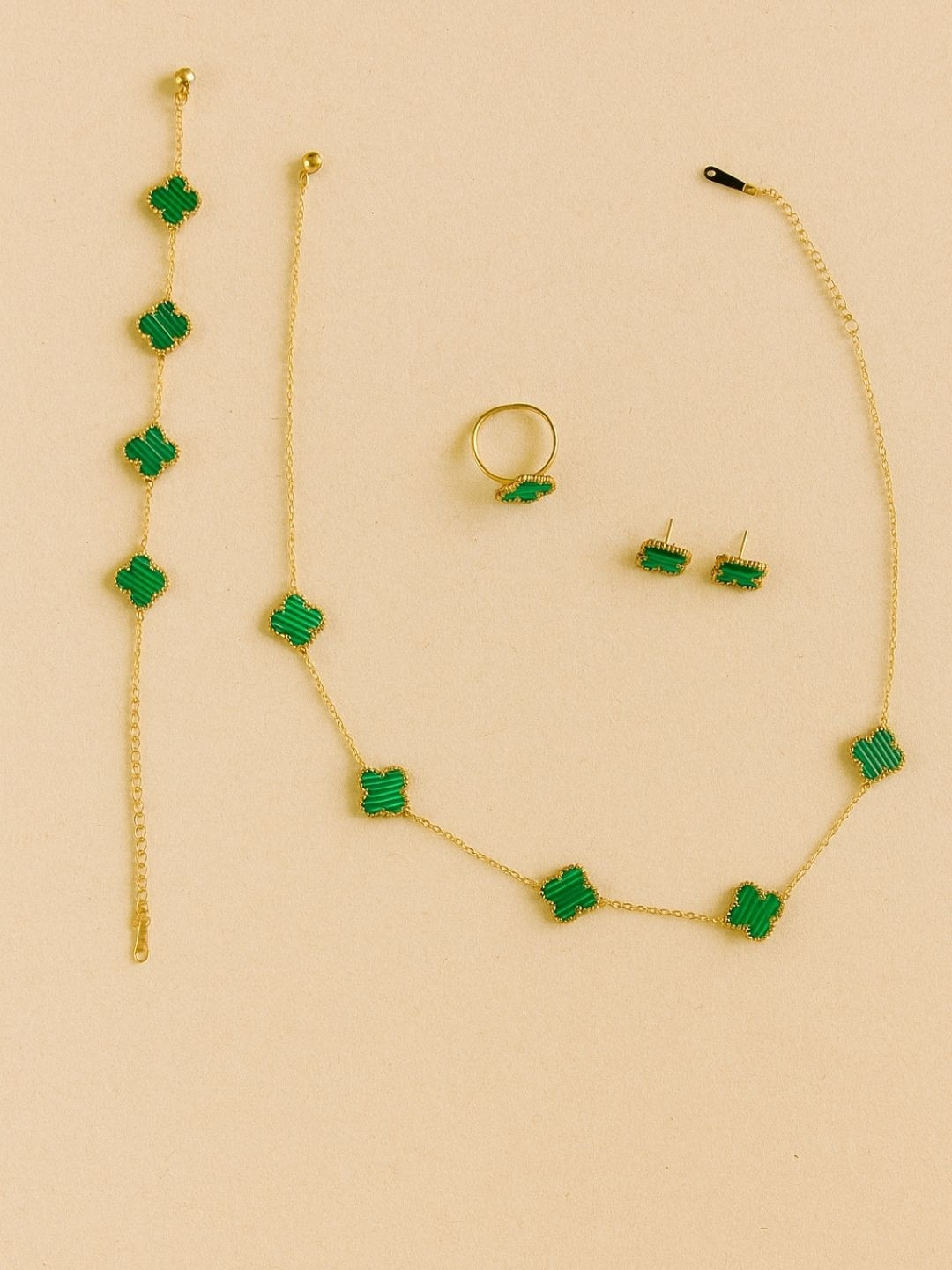 Women Click Gold-Plated Stone-Studded Jewellery Set