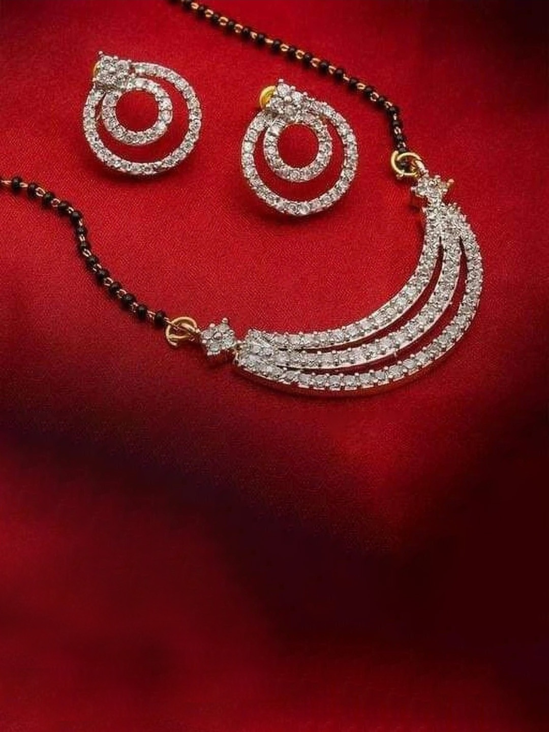 NAVYA Artificial Stones Studded & Beaded Mangalsutra With Earrings