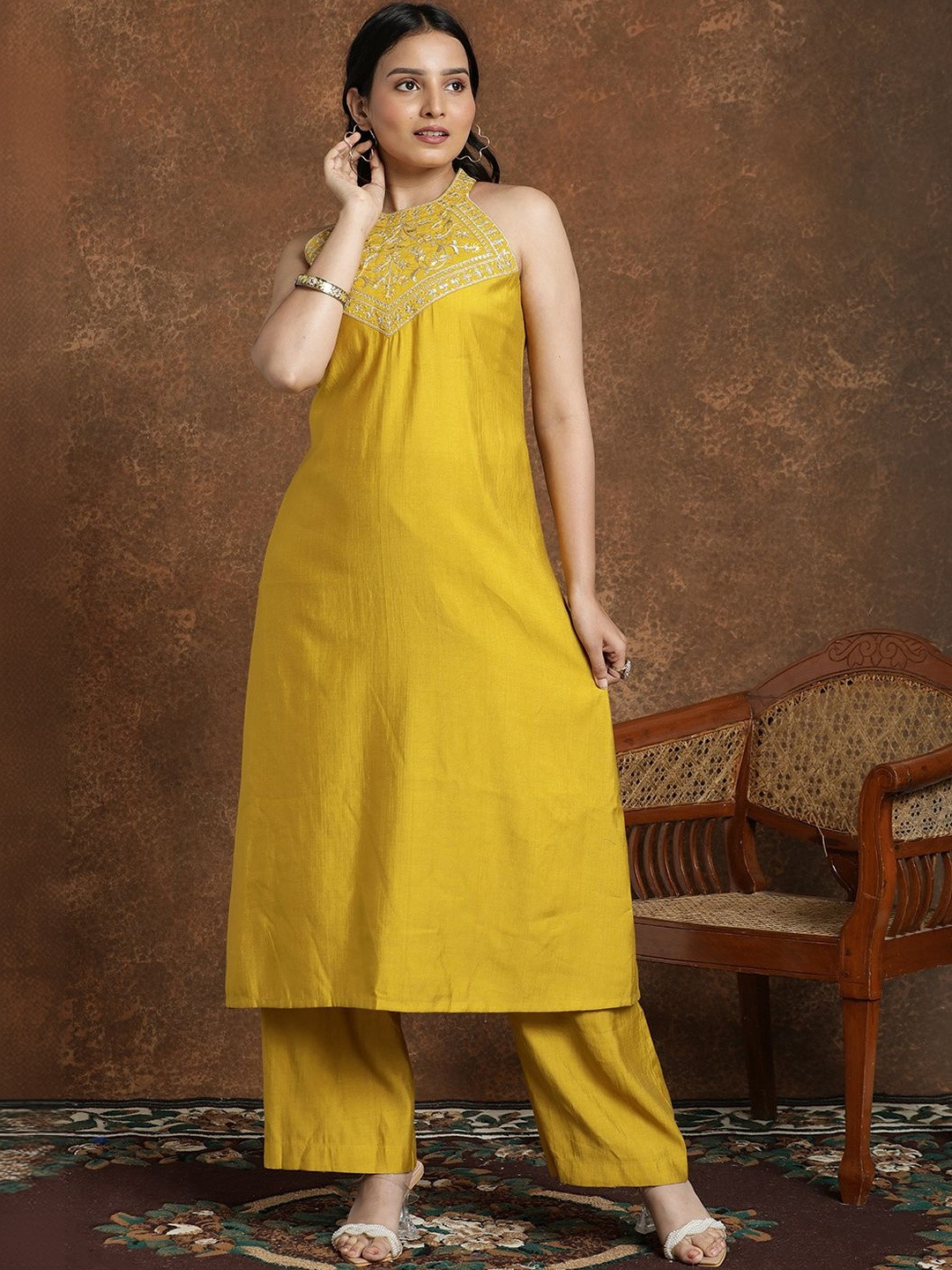 AVANSHEE Floral Embroidered Halter Neck No Sleeves Thread Work A-Line Kurta With Palazzos