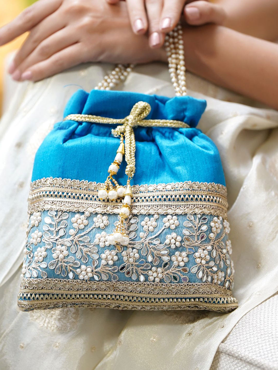 Rubans Women Embellished Wrist Loop Potli Clutch with Golden Zari Border & Beaded Handle