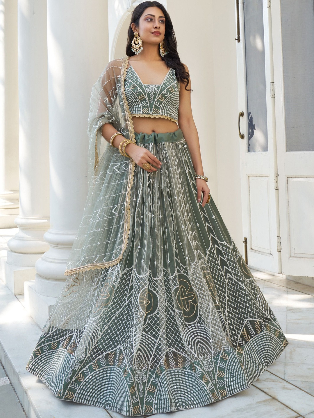 DREAM EXPORTER Embroidered Sequinned Net Semi-Stitched Lehenga & Blouse With Dupatta