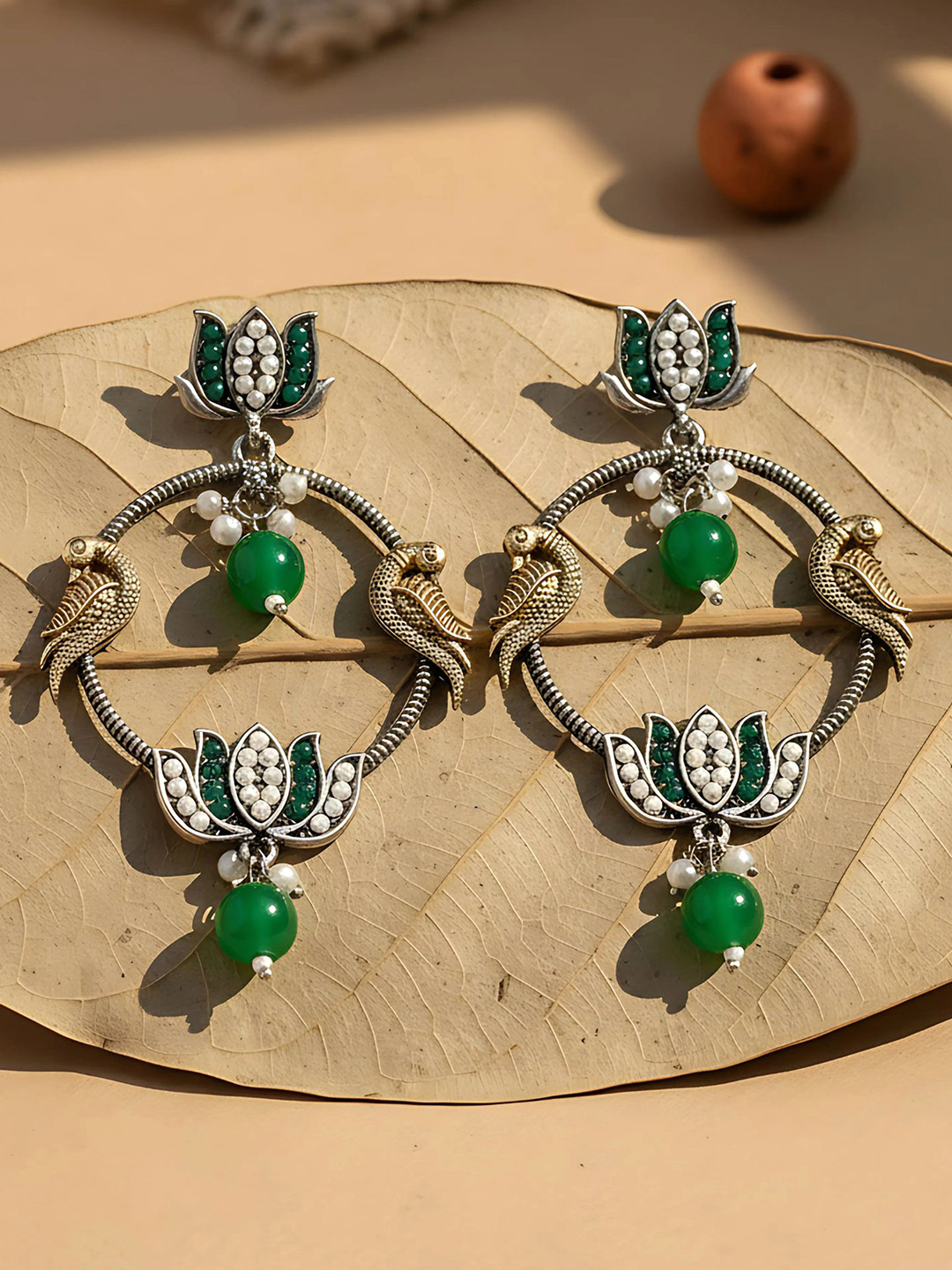 KARATCART Silver-Plated Kundan Studded Lotus Tribal Drop Earrings