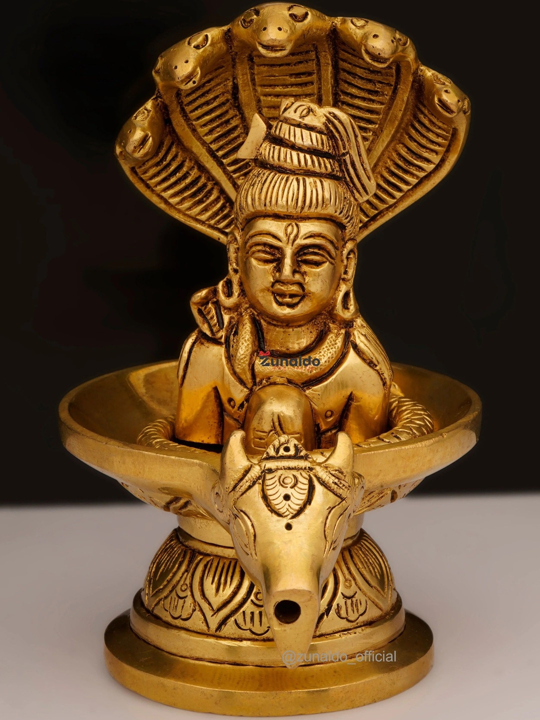 Zunaldo Showpieces Yellow Brass Shivling With Shiva Head & Trishul Showpieces