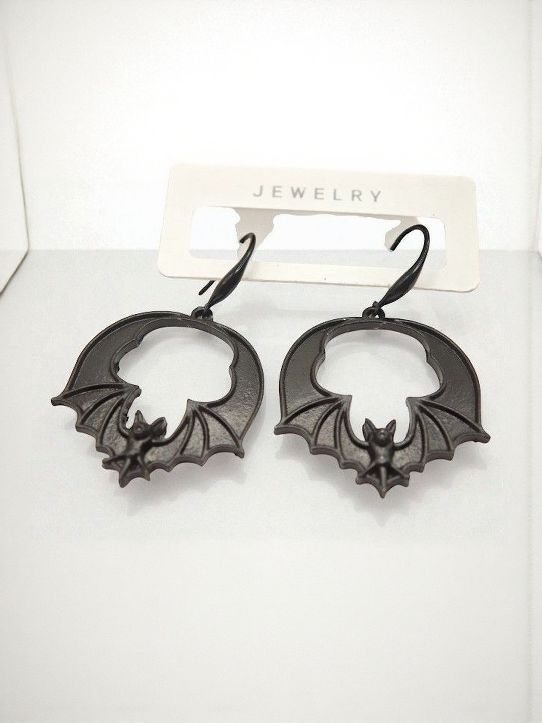 SAPRAA TRENDS Stainless Steel Silver-Plated Bat Man Shaped Halloween Drop Earrings