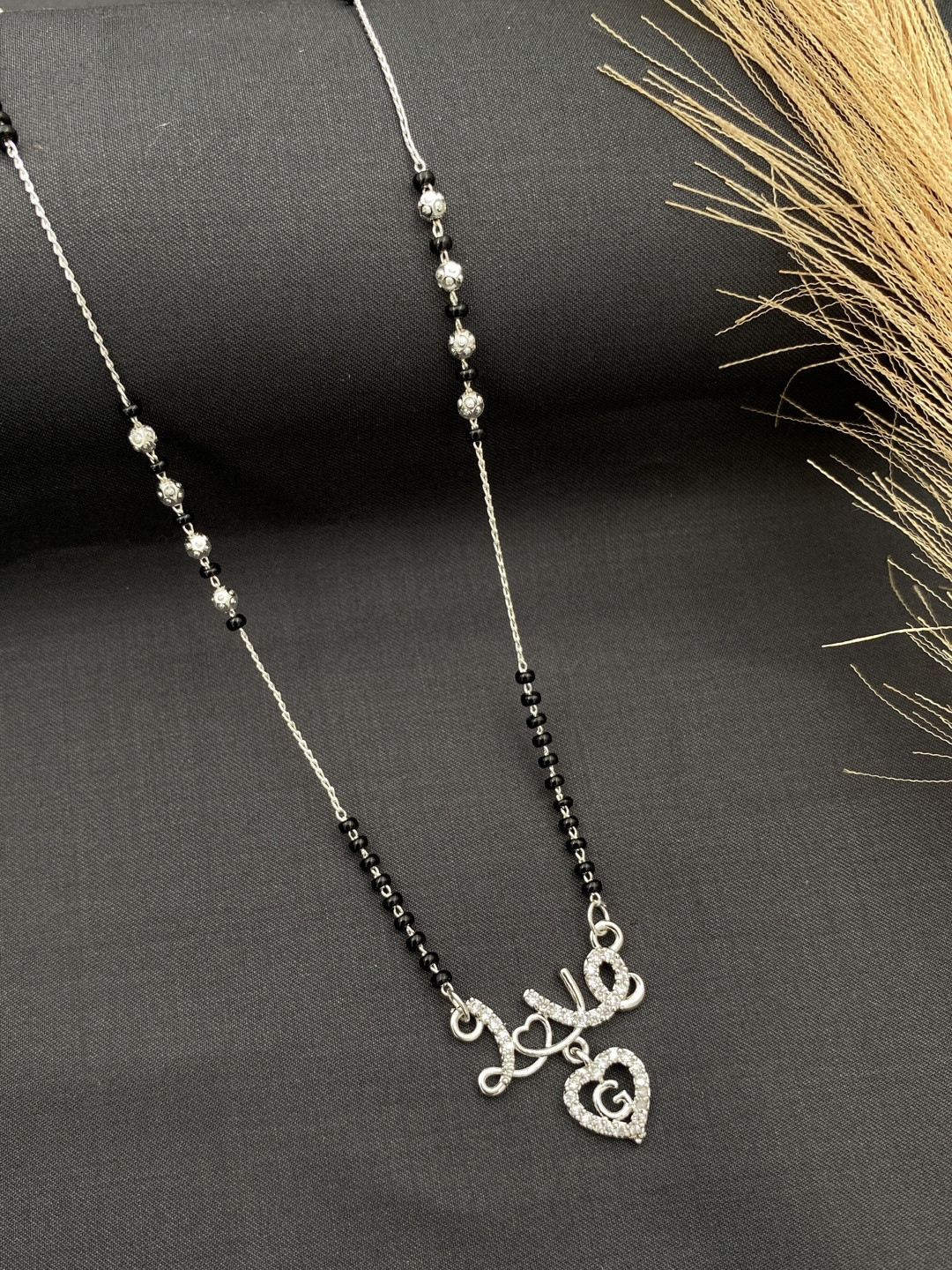 Laksh Enterprise Artificial Stones Studded & Beaded Heart Shaped G Alphabet Mangalsutra