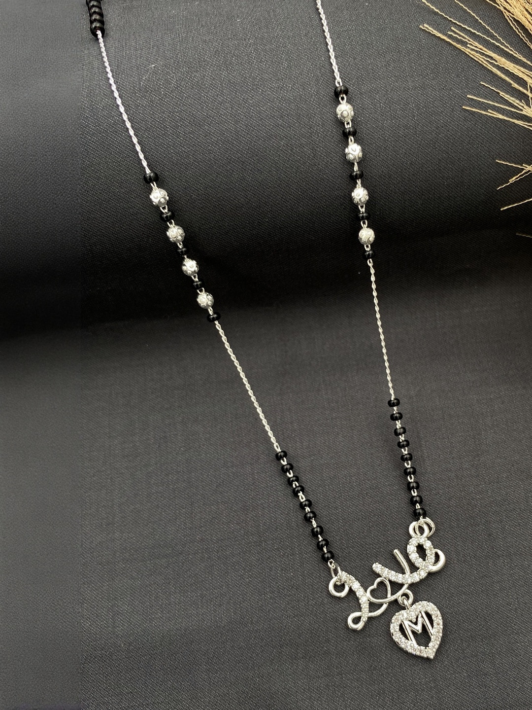 Laksh Enterprise Artificial Stones Studded & Beaded Heart Shaped M Alphabet Mangalsutra
