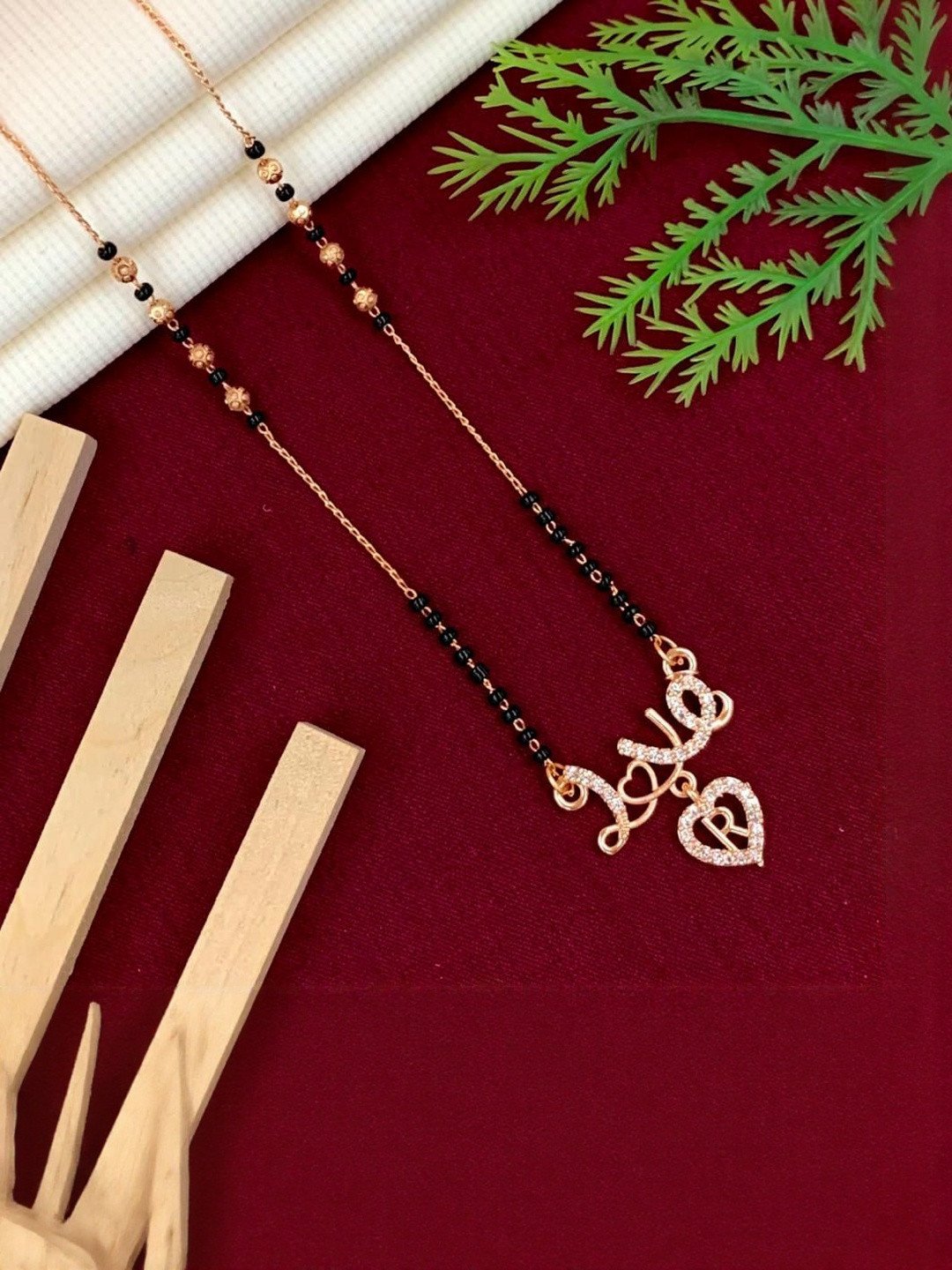 Laksh Enterprise Artificial Stones Studded & Beaded Heart Shaped R Alphabet Mangalsutra