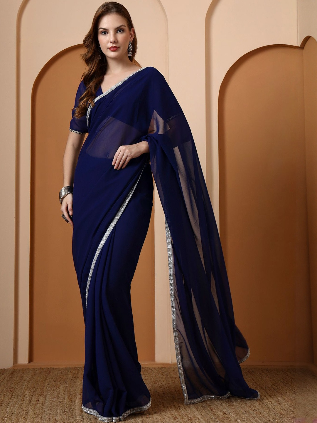 Salvia Sky Women Solid Embellished Border Pure Georgette Saree
