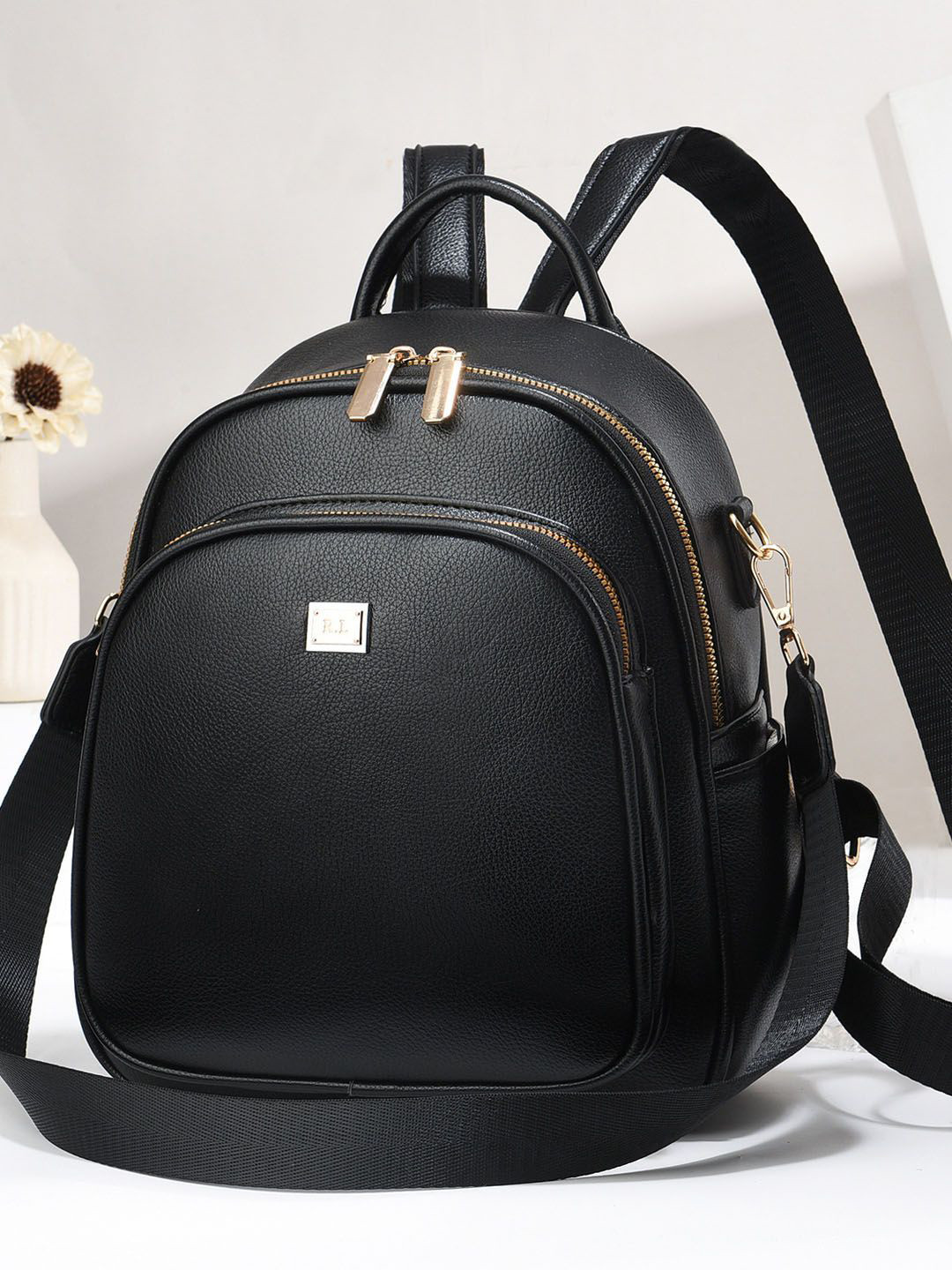 StyleCast Women Medium Textured Backpack With Detachable Handle & Earphone Gate