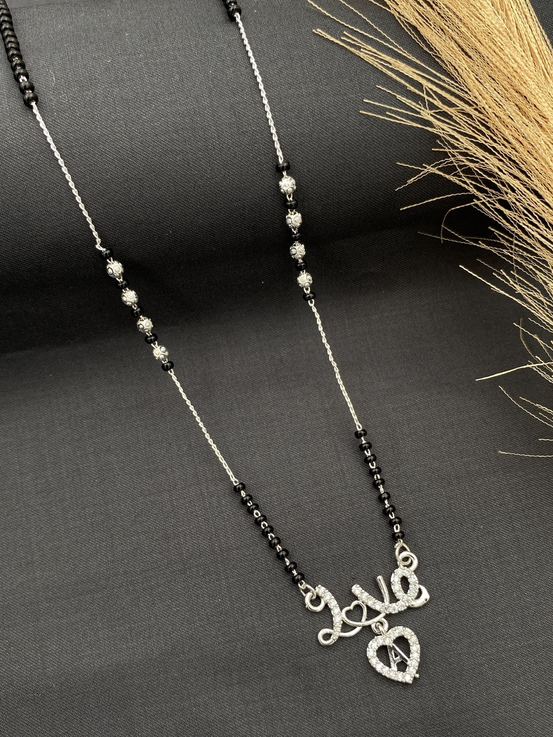 Laksh Enterprise Artificial Stones Studded & Beaded Heart Shaped A Alphabet Mangalsutra