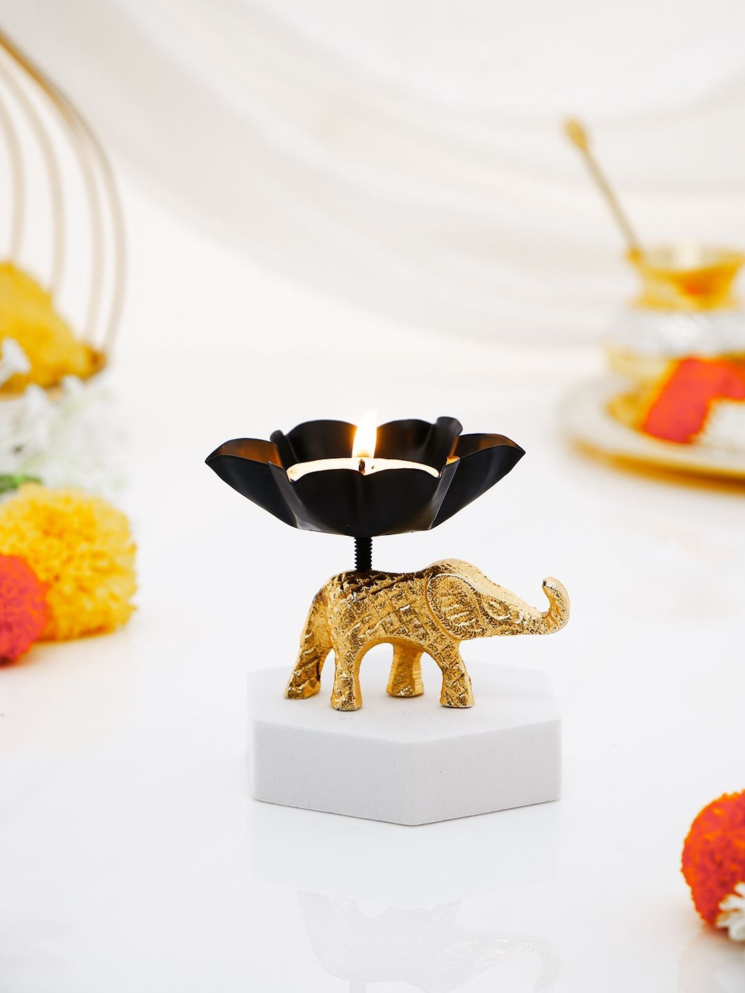 Archies Gold Toned and Black Lightweight Elephant Diya