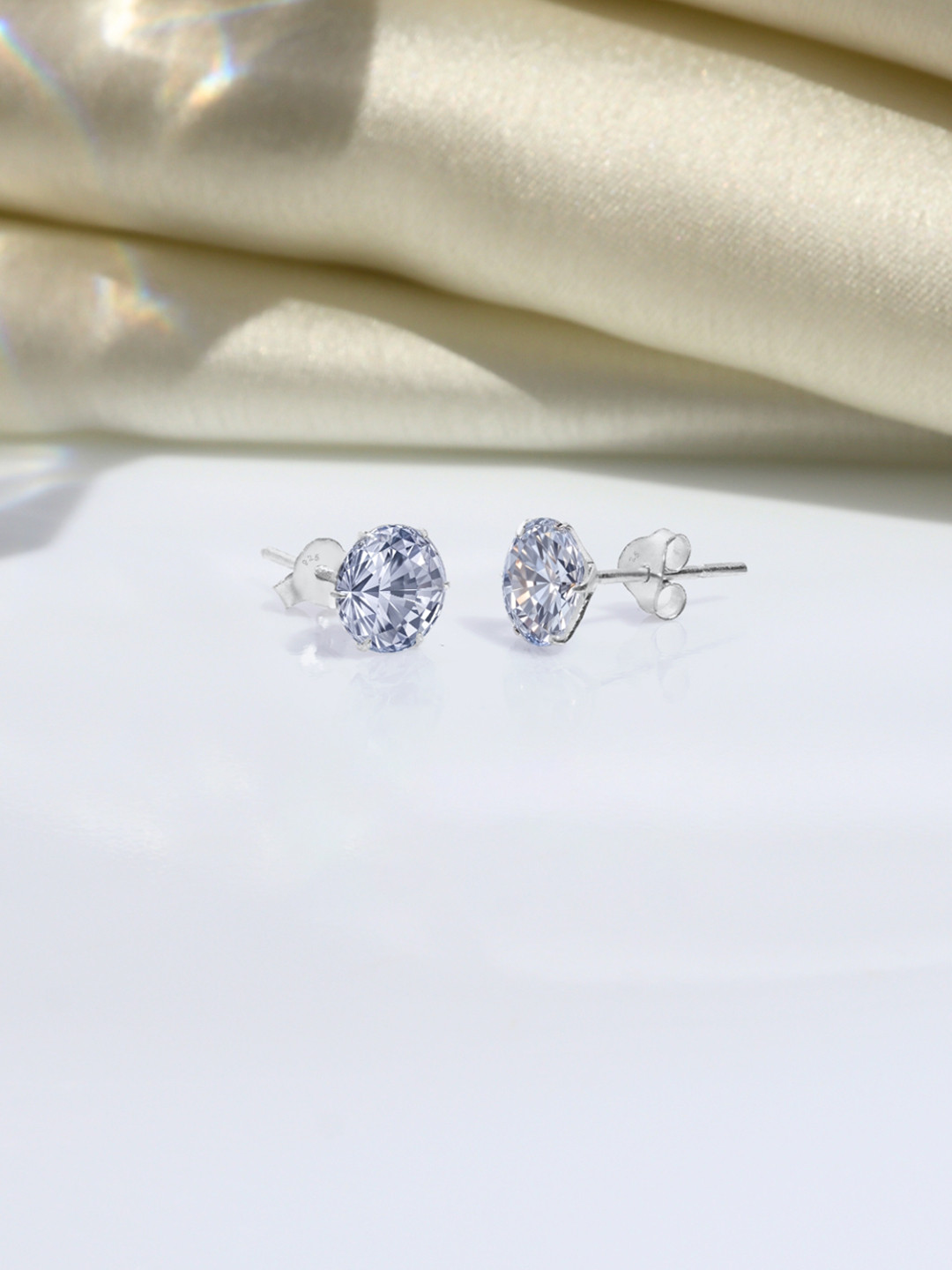 HighSpark 92.5 Silver Cubic Zirconia Studded Round Studs Earrings - 7mm