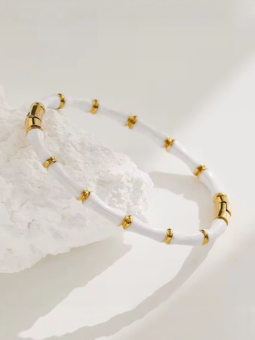 Nitant White And Golden Anti Tarnish Sleek Hand Bracelet